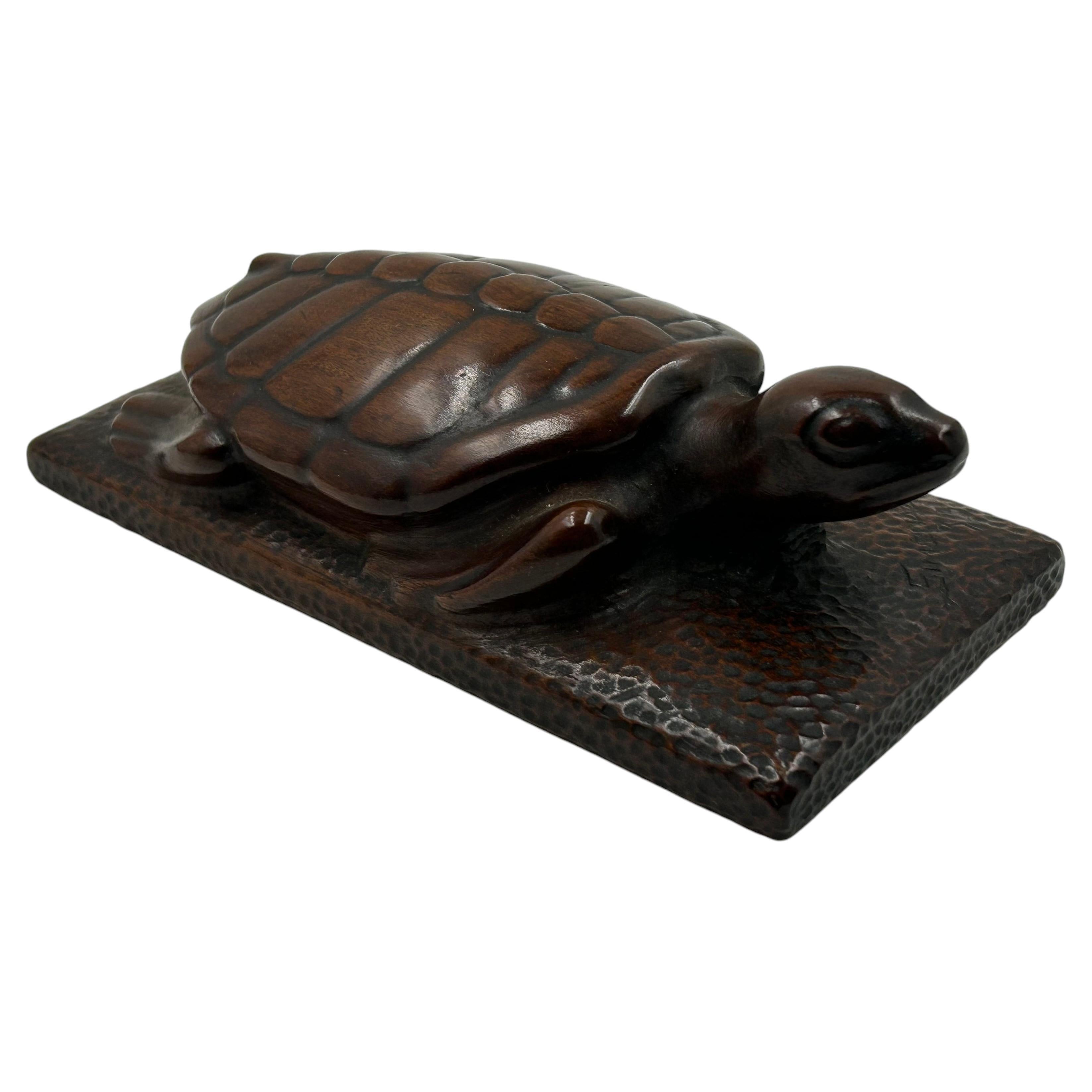 Hand-carved wooden turtle sculpture by A. Simonazzi
