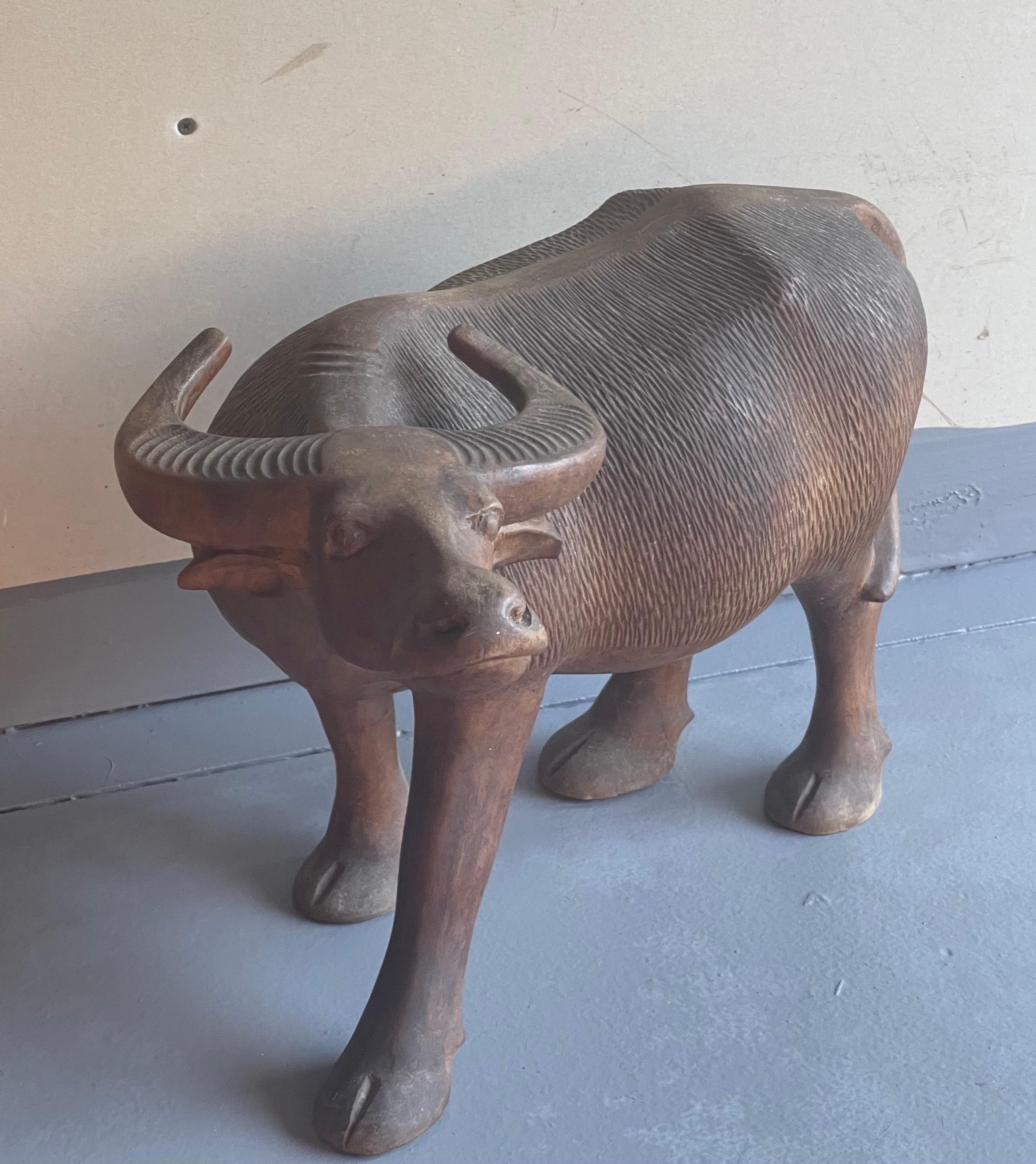 wooden buffalo statue