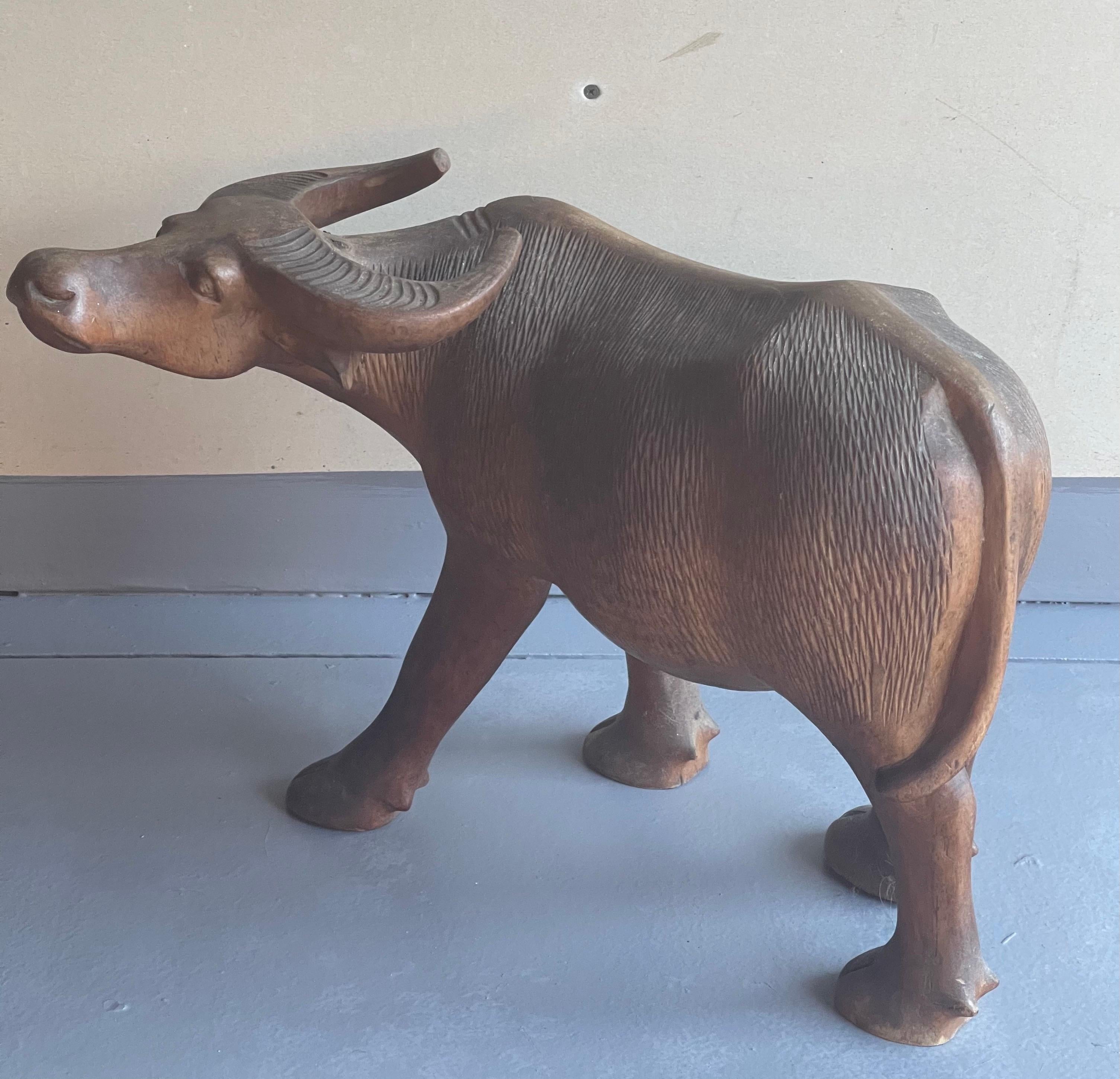 carved wooden buffalo