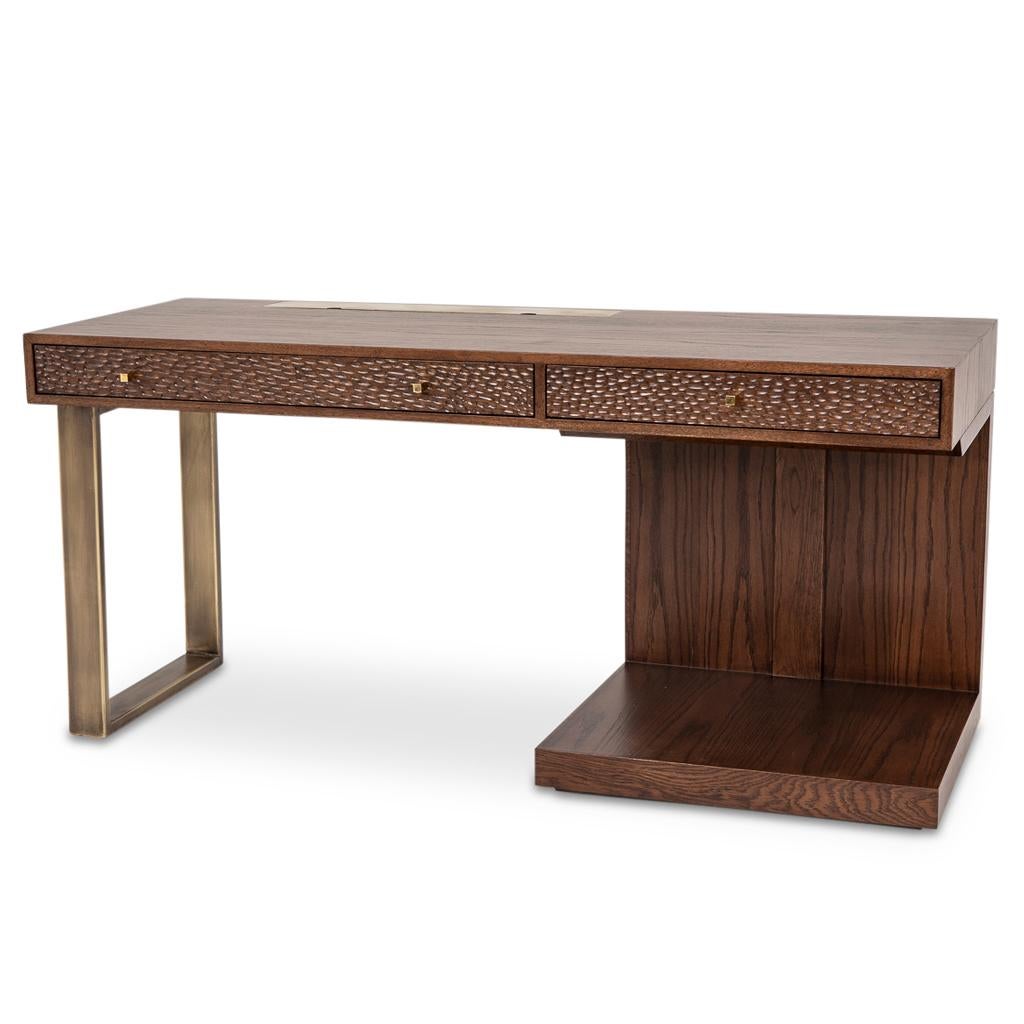 This hand chiseled desk was designed by Egg Designs for a high end safari lodge in Southern Africa. The robust hand chiseled markings make this a stand out piece, textured and unique. The materials are a combination of tinted solid and veneer oak