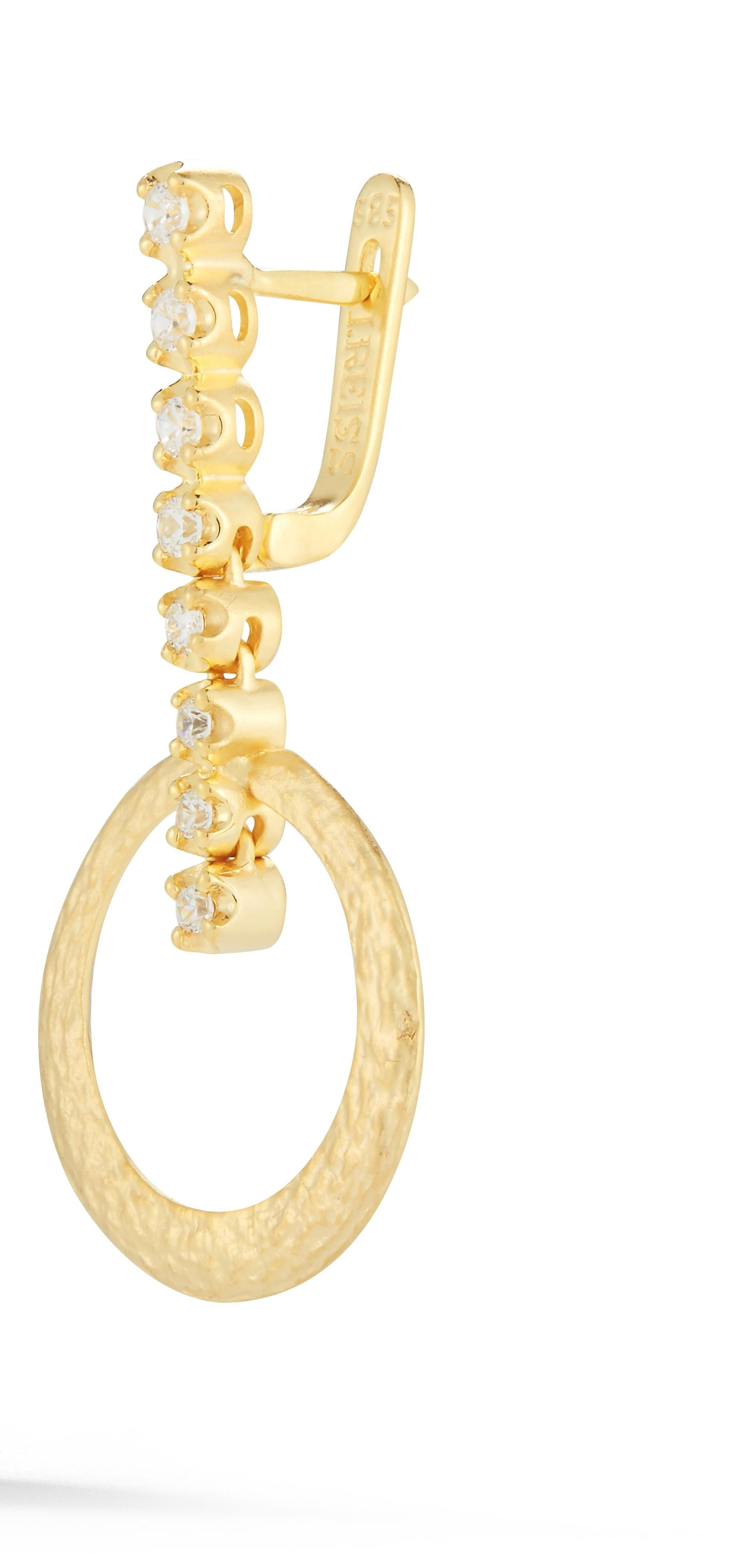 14 Karat Yellow Gold Hand-Crafted Matte and Textured Dangling Open Circle Earrings, Accented with 0.33 Carats of Prong Set Diamonds on a Leverback.
