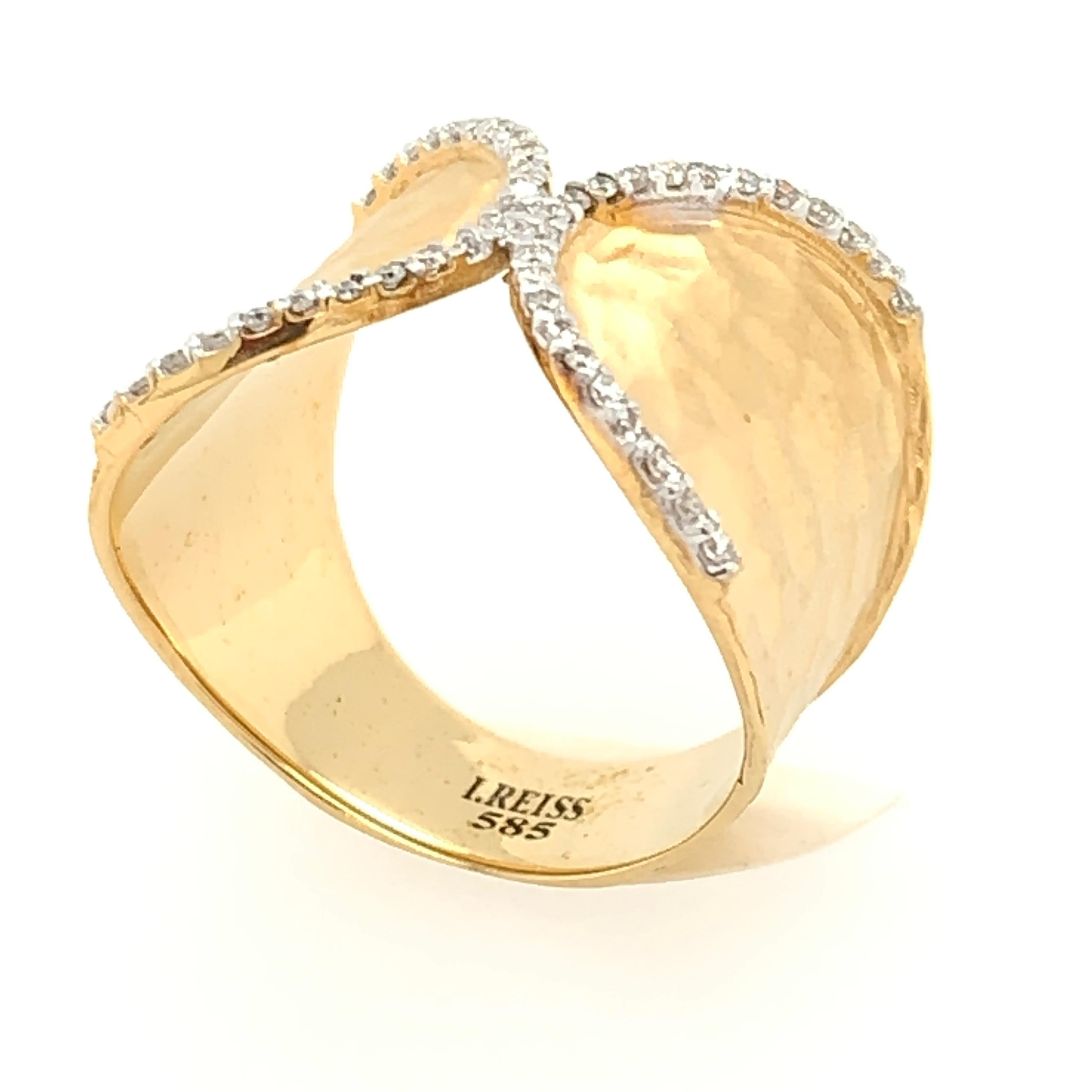 14 Karat Yellow Gold Matte and Hammer-Finished Horse-Shoe Cigar Ring, Enhanced with 0.28 Carats of Pave Set Diamonds.
