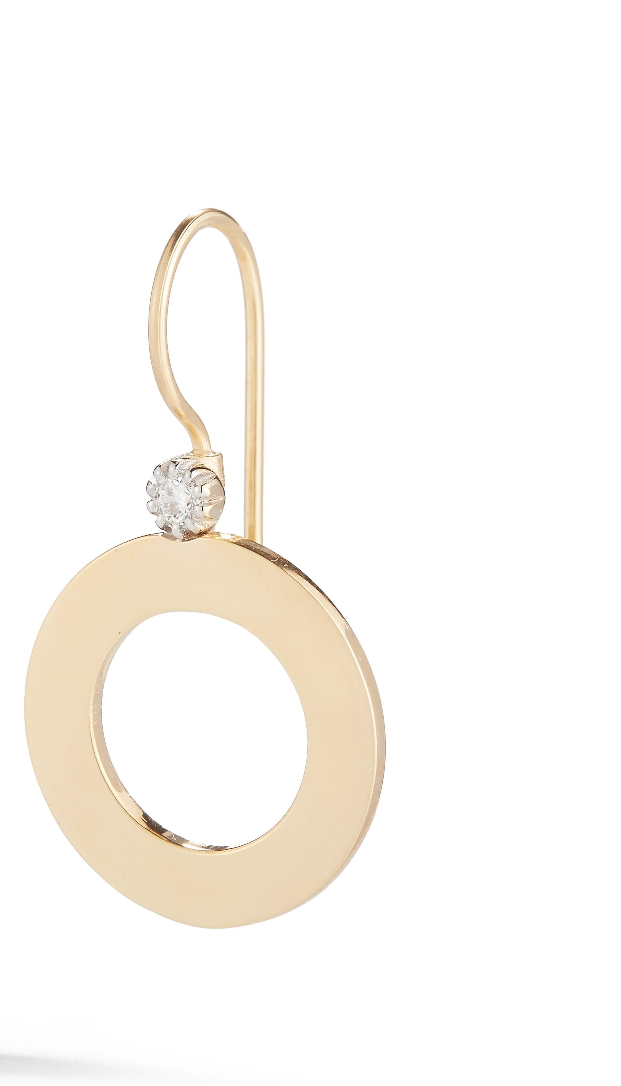 14 Karat Yellow Gold Hand-Crafted Polish-Finished Open Circle Drop Earrings, Accented with 0.10 Carats of Prong Diamonds and Set on a French Hook Closure.
