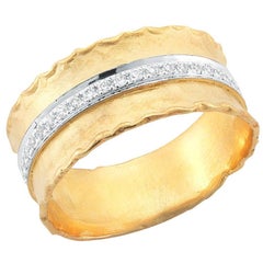 Bague artisanale en or jaune 14 carats à bord volanté