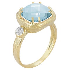 Hecho a mano en oro de 14 quilates 0,03 ct. tw. Anillo de diamantes y topacio azul de 10 mm y 4,75 quilates