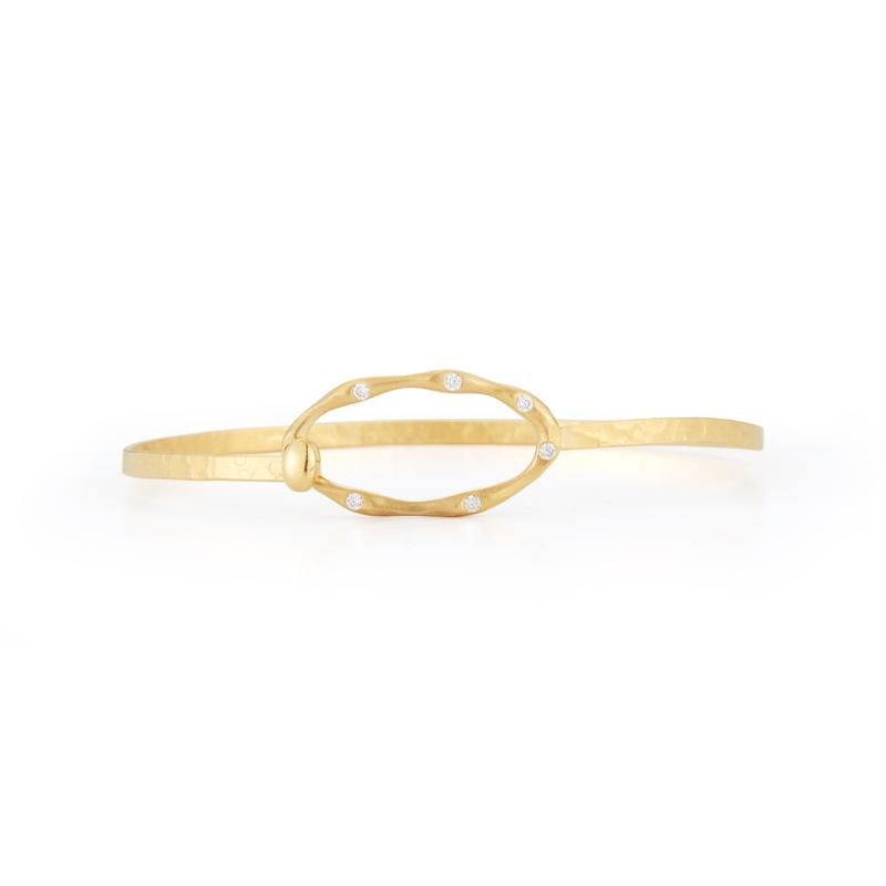 14 Karat Yellow Gold Hand-Crafted Matte and Hammer-Finished Hinge-Clasp Open Oval Bangle Bracelet, Accented with 0.13 Carats of Burnish Set Diamonds.
