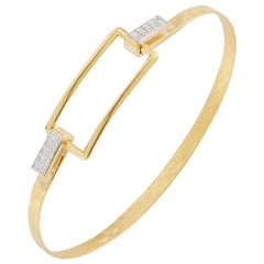 Bracelet jonc artisanal en or jaune 14 carats, serti d'un motif rectangulaire ouvert