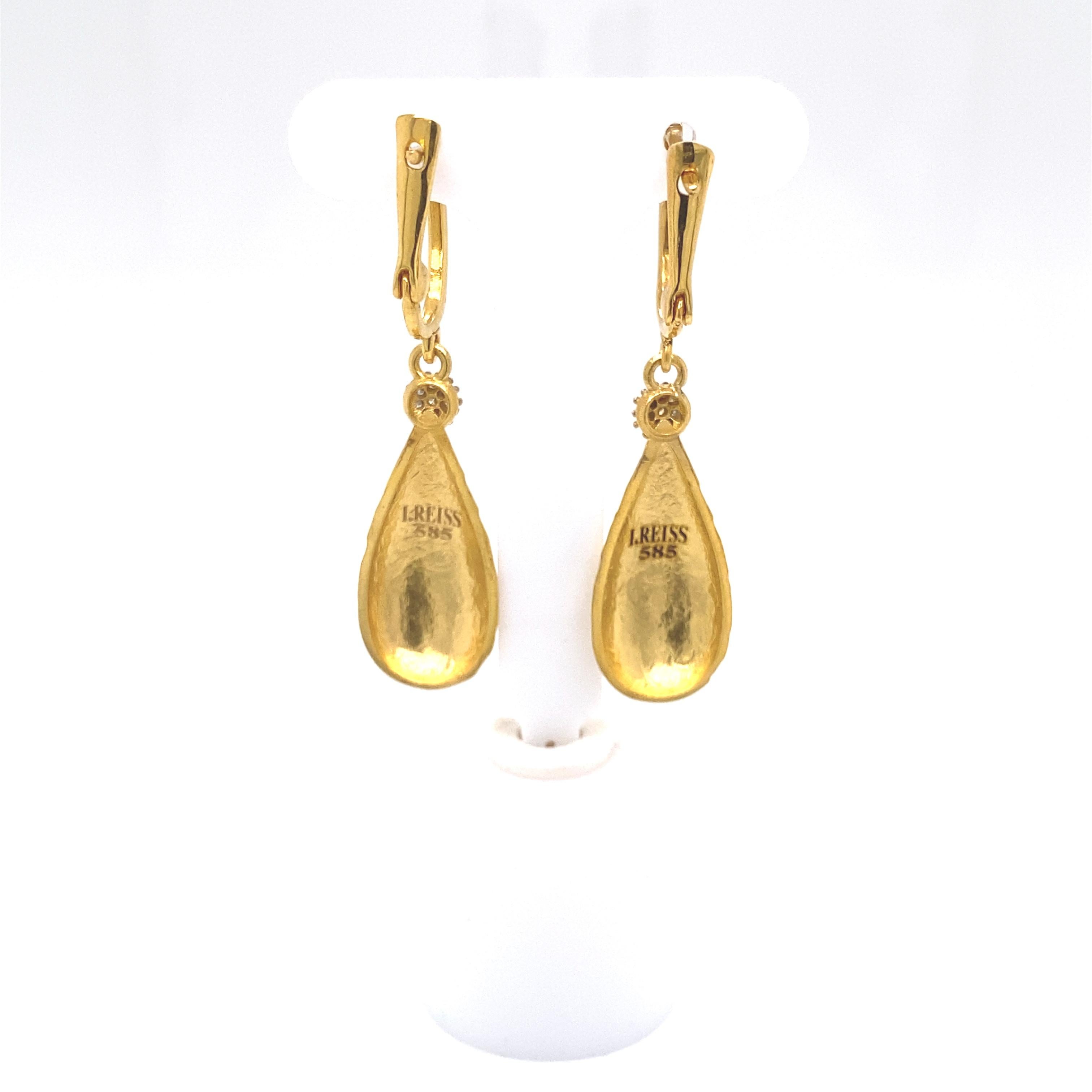 14 Karat Yellow Gold Hand-Crafted Matte and Hammer-Finished Dangling Tear-Drop Earrings, Accented with 0.20 Carats of Pave Set Diamonds.
