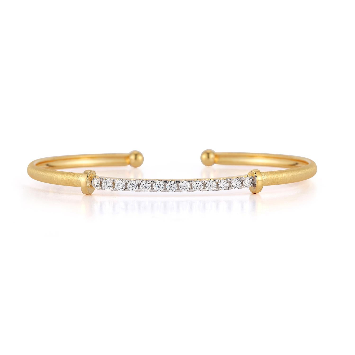 14 Karat Yellow Gold Hand-Crafted Matte-Finished Flexible Bangle Bracelet, Accented with 0.50 Carats of Pave Set Diamonds.
