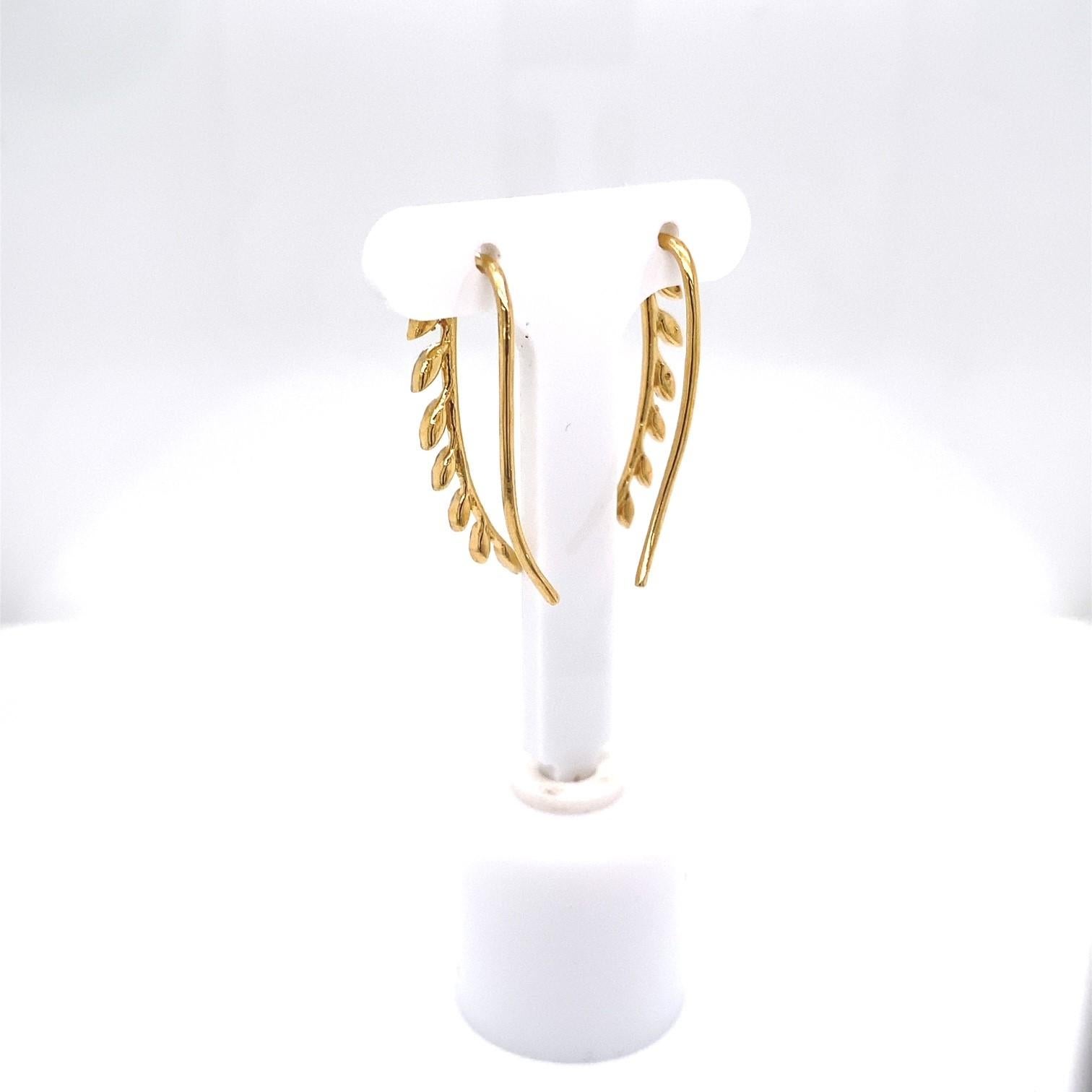 gold leaf climber earrings