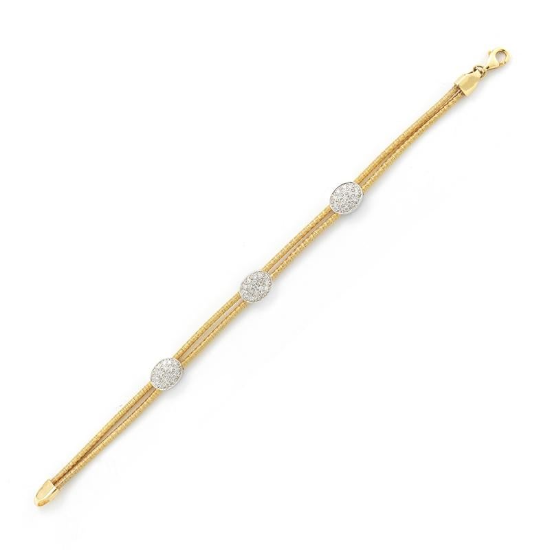 14 Karat Yellow Gold Hand-Crafted Double Strand Mesh Bracelet, Enhanced with 0.57 Carats of 3 Pave Set Diamond Oval Stations.
