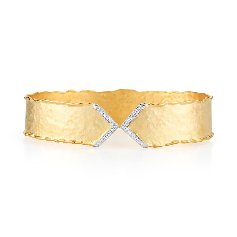 14 Karat Yellow Gold Hand-Crafted Matte and Hammer-Finished Scallop-Edged Narrow Chevron Cuff Bracelet, Accented with 0.18 Carats of Pave Set Diamond End Caps.
