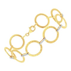 Pulsera artesanal de eslabones circulares abiertos de oro amarillo de 14k