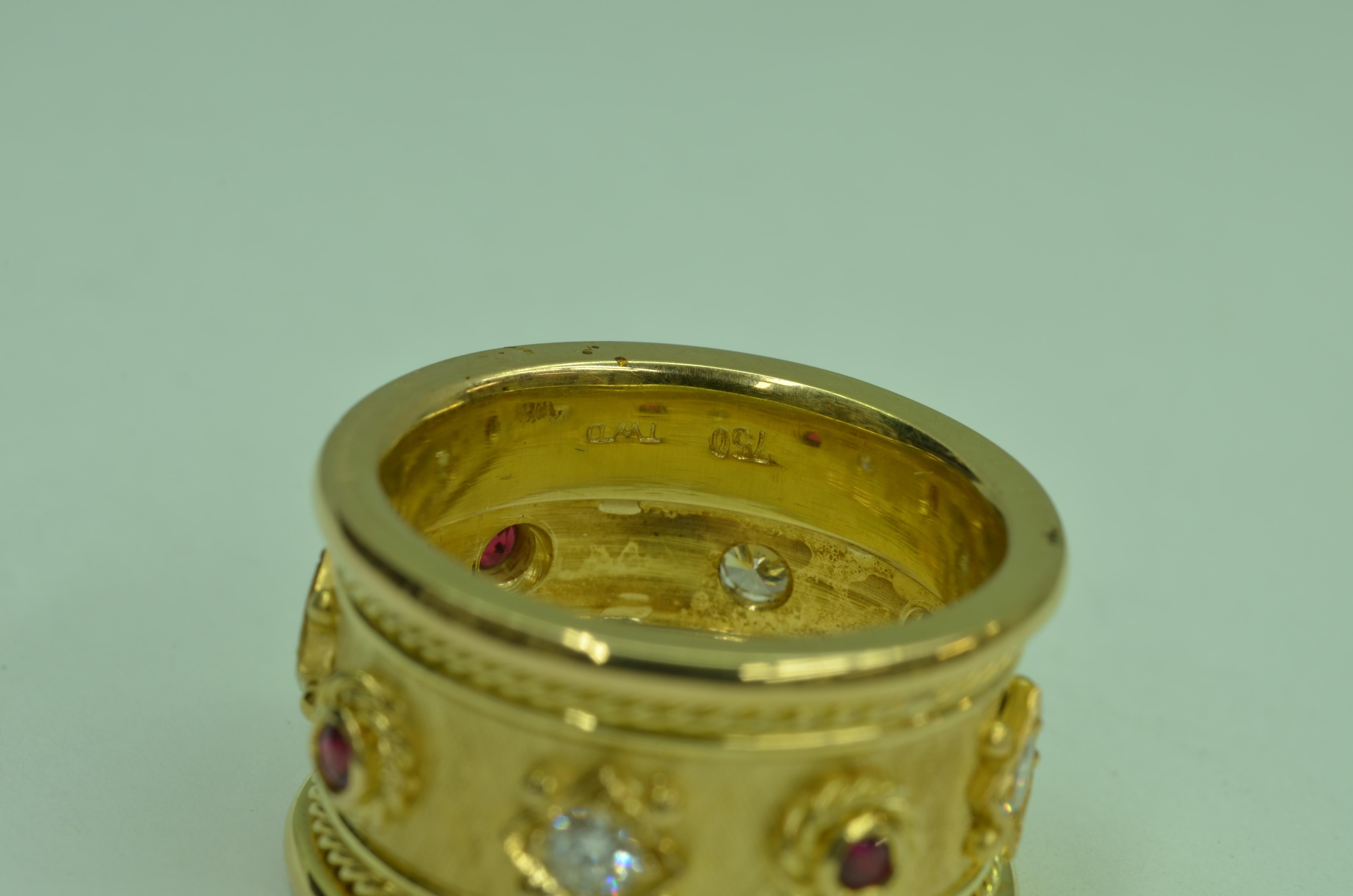 A beautifully hand crafted 18 Karat yellow gold Diamond and Ruby cigar Band ring. I recently completed this striking cigar band at my studio in Maine, entirely hand made in 18 Karat gold. Set with four round brilliant cut Diamonds and four round