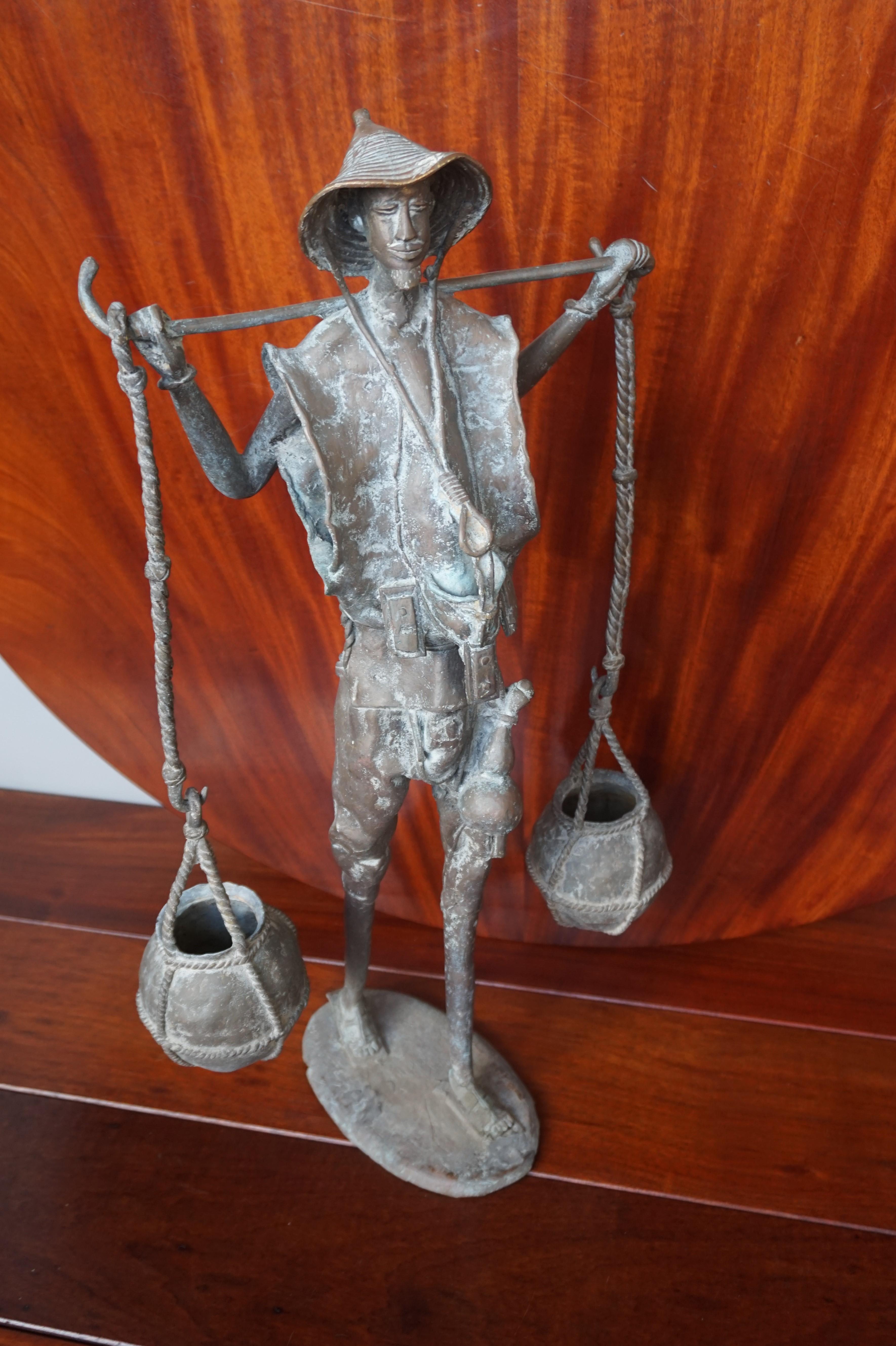 Handcrafted and Wonderful Tall African Male Water Carrier Bronze Sculpture For Sale 7