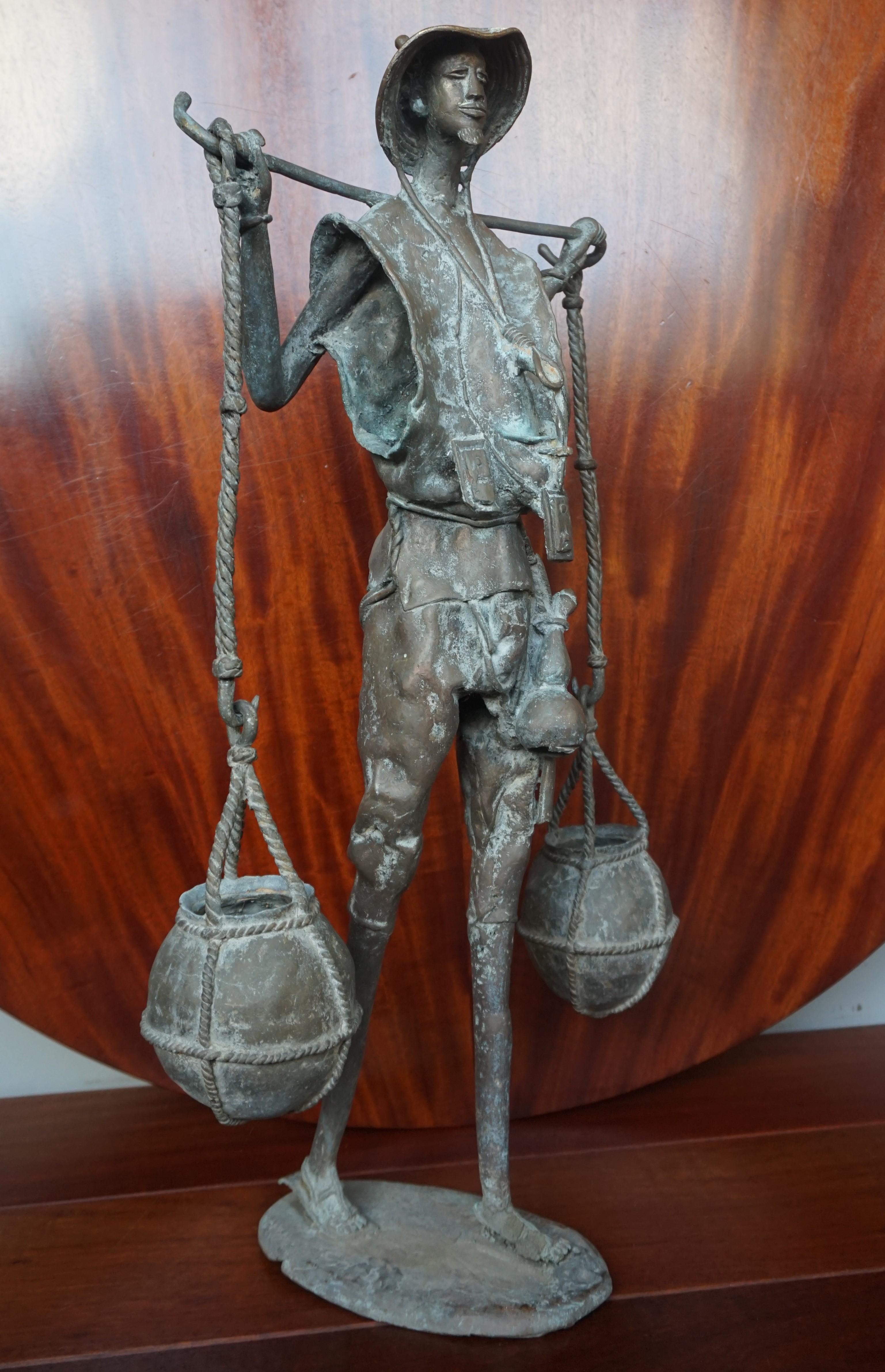 Handcrafted and Wonderful Tall African Male Water Carrier Bronze Sculpture For Sale 8