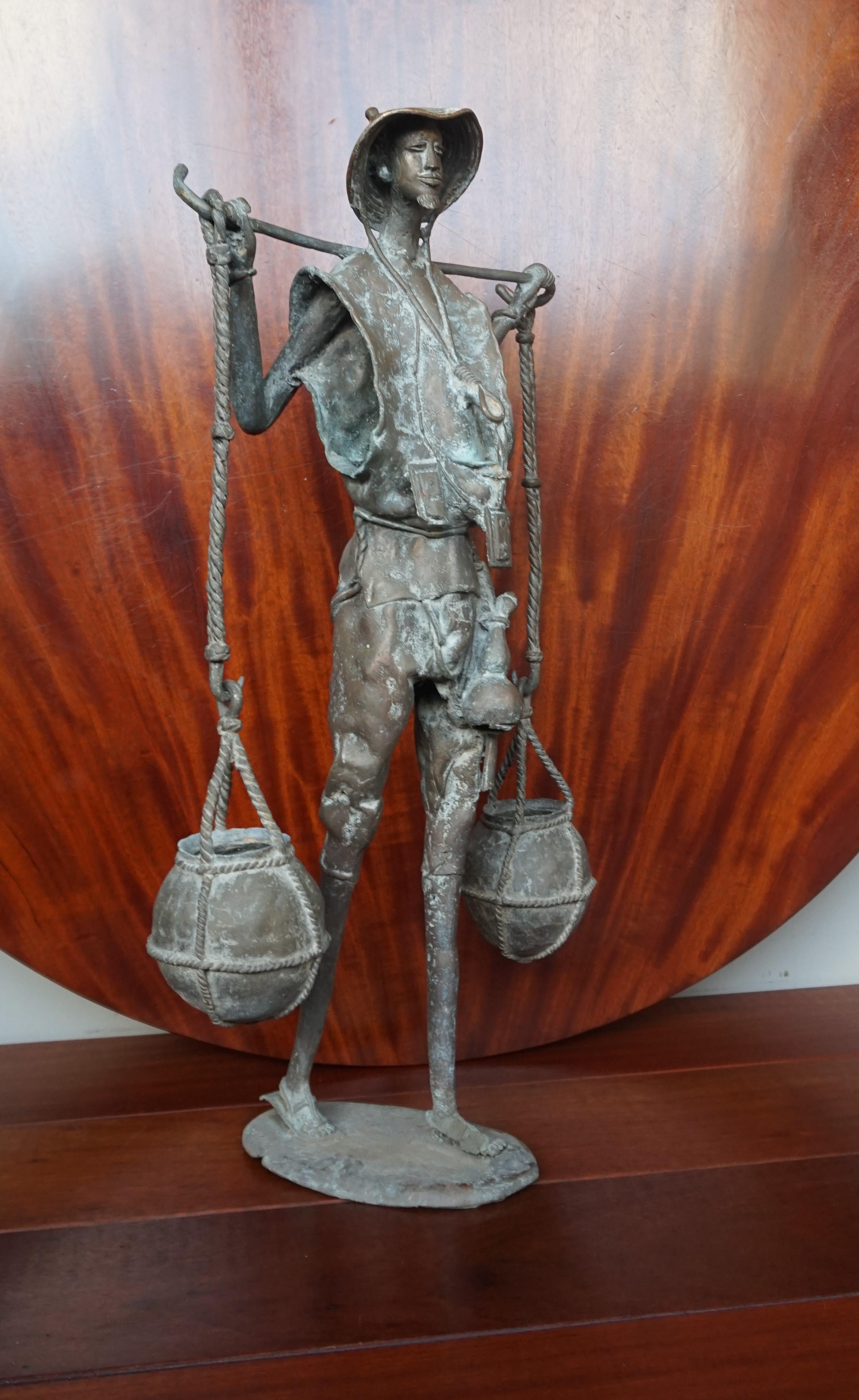 Beautifully handcrafted, traditional African bronze sculpture.

If you are looking for a unique and beautifully handcrafted bronze sculpture to grace your living space then this traditional African male water carrier could be perfect for you. We
