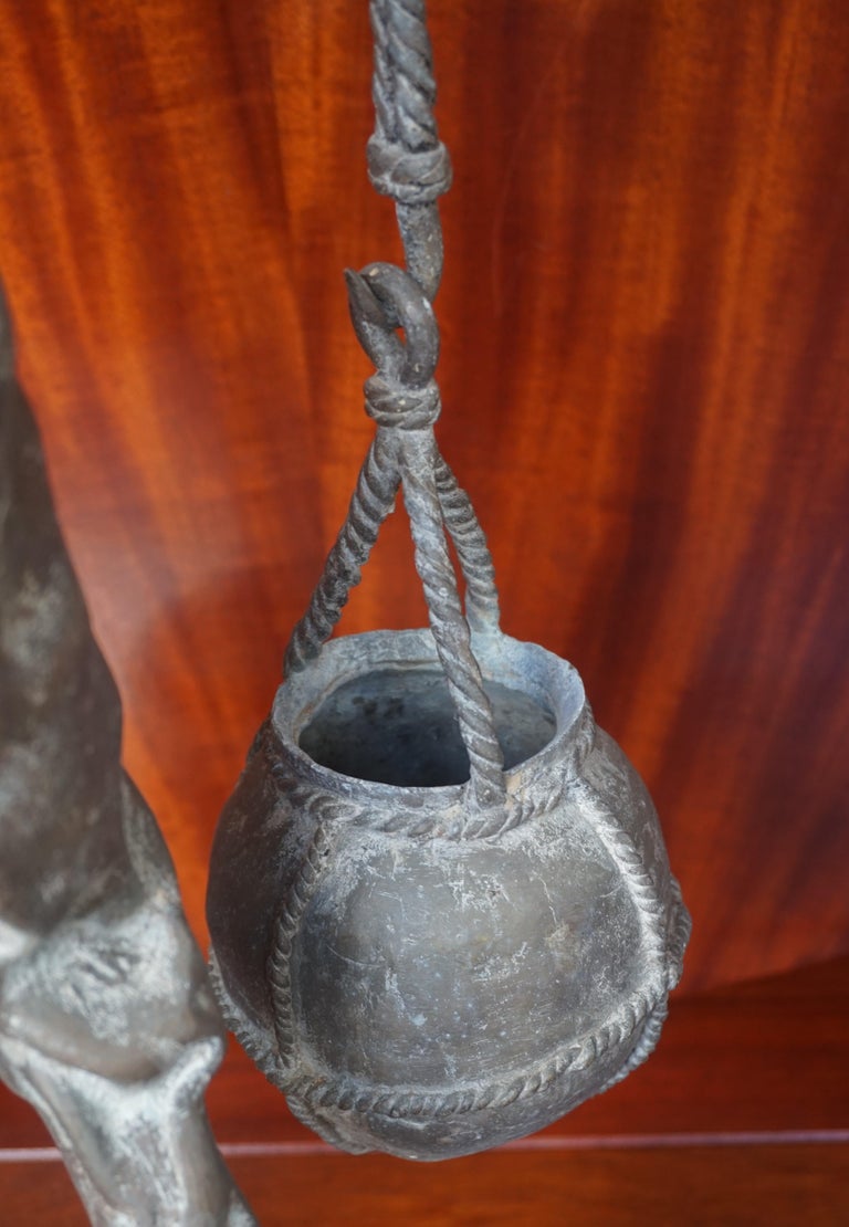 Handcrafted and Wonderful Tall African Male Water Carrier Bronze