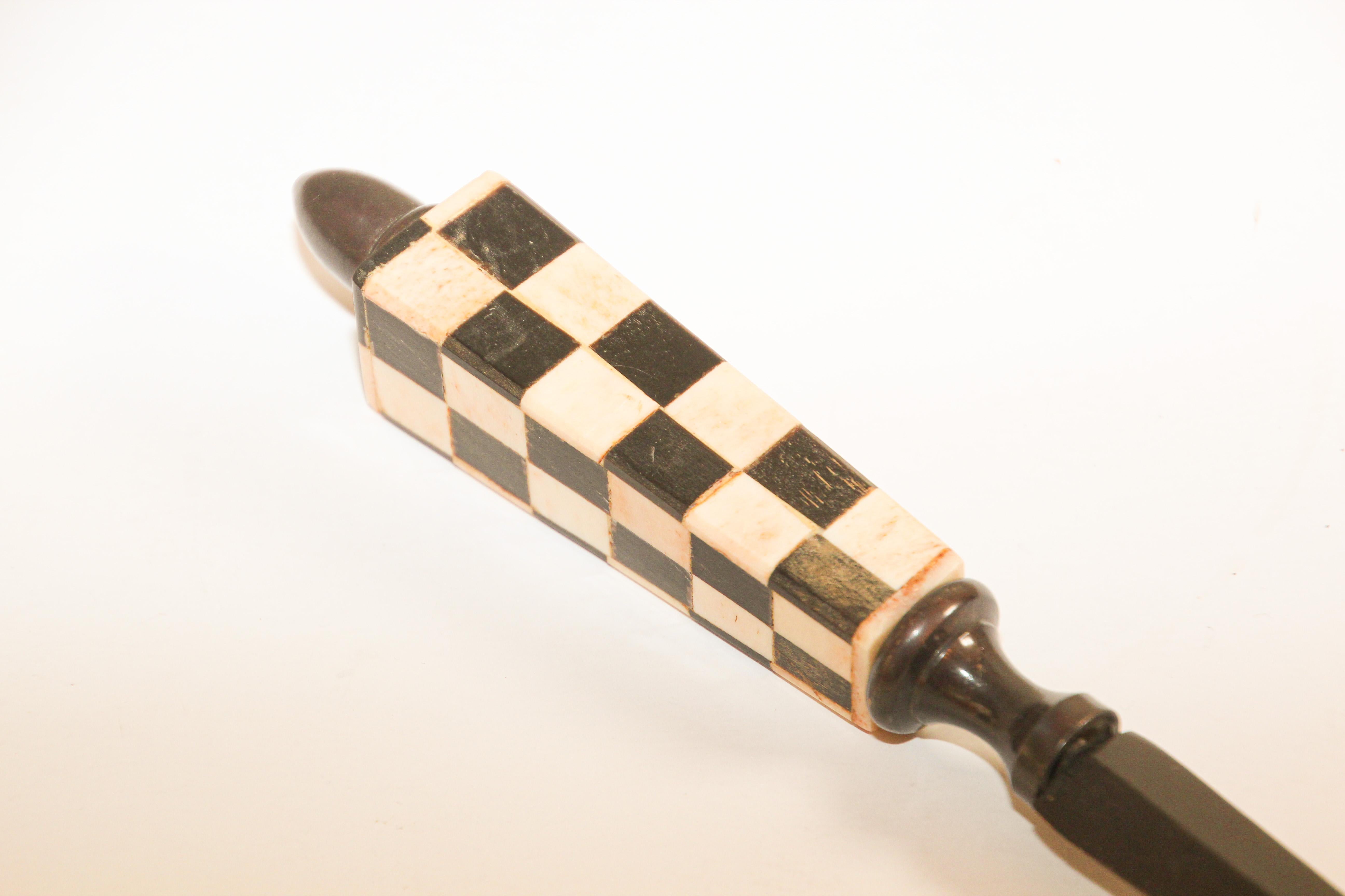 Handcrafted beautiful artisan made letter opener with black and white checker board Buffalo bone clad handle and blade in dark oiled bronze patina
Length: 11