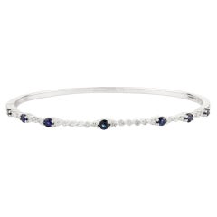 Pulsera artesanal de zafiro azul y diamantes en oro blanco de 14 quilates para ella