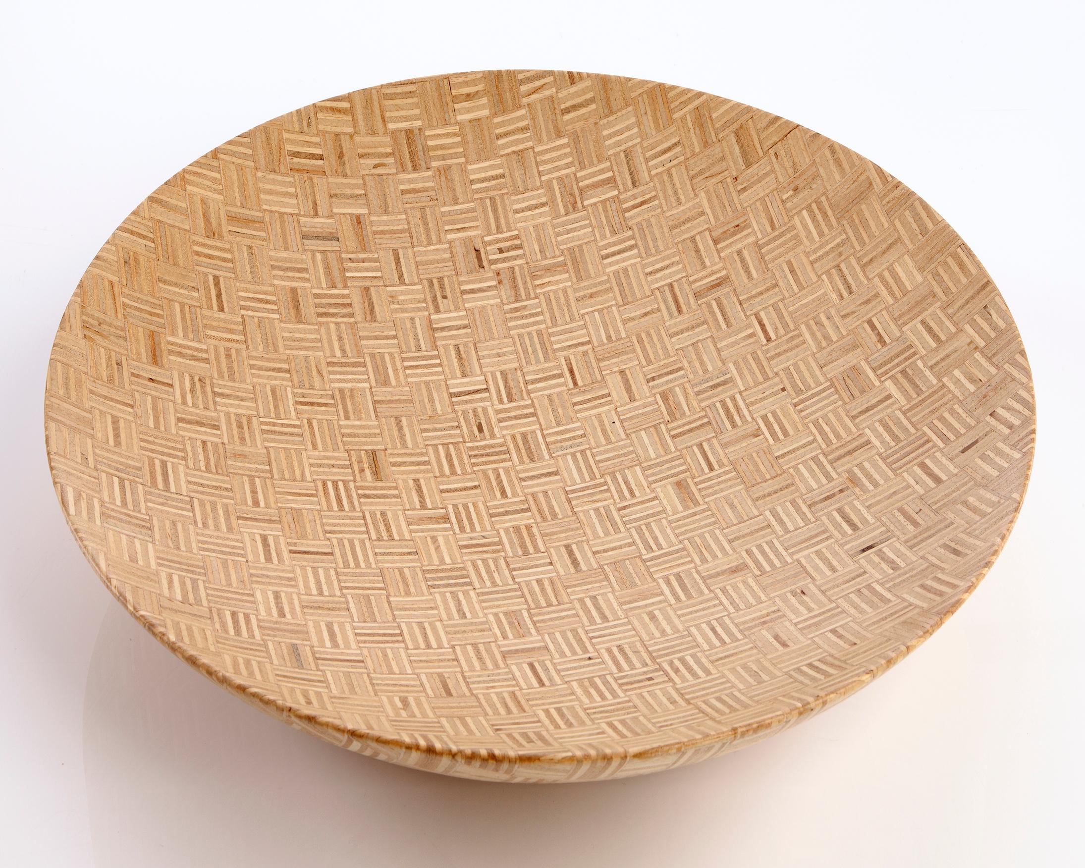 Inlaid bowl handcrafted in stack-laminated Brazilian hardwood. Designed and made by Julia Krantz, Sao Paulo, Brazil, 2007.
 