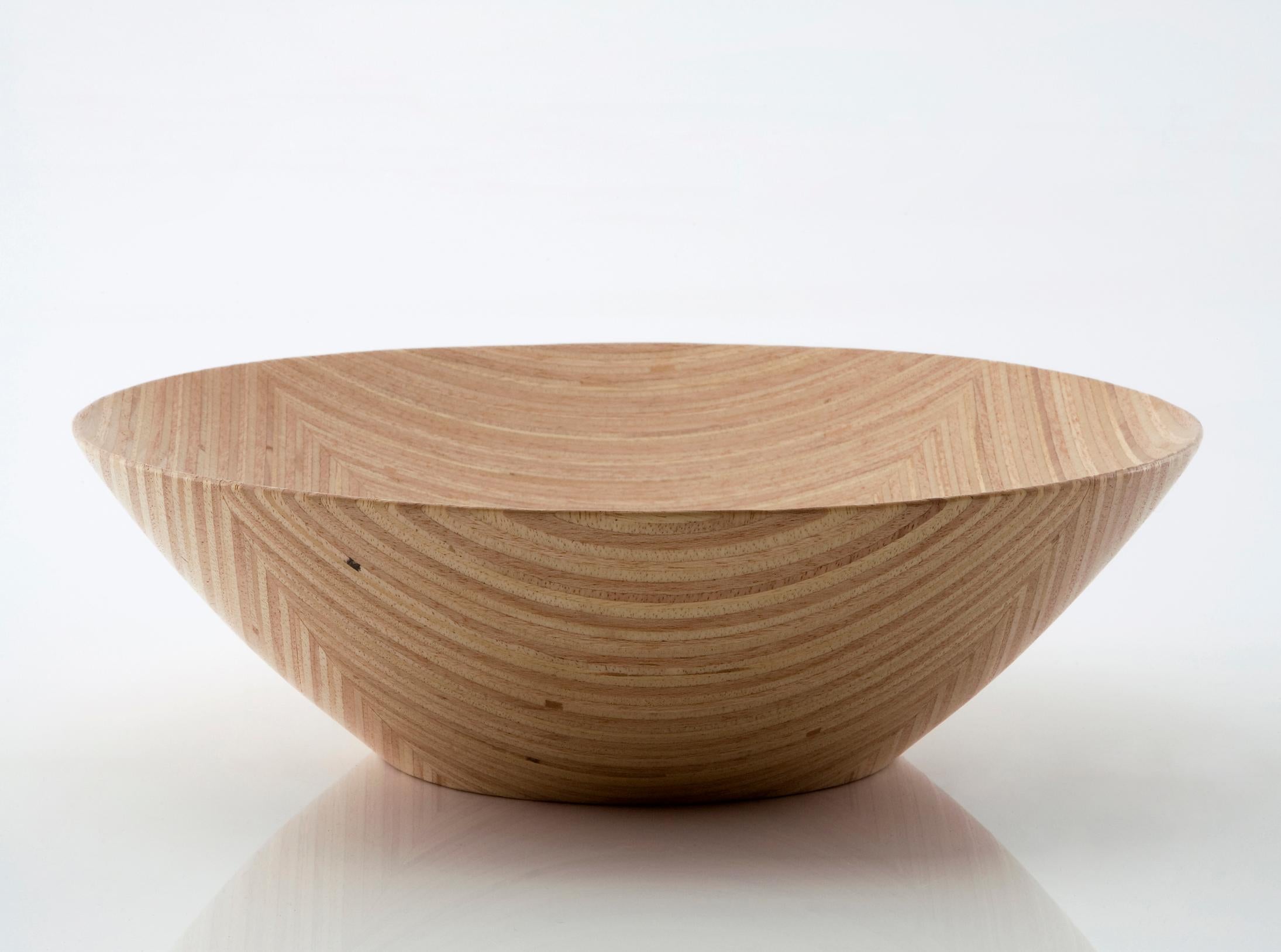 Inlaid bowl handcrafted in stack-laminated Brazilian hardwood. Designed and made by Julia Krantz, Sao Paulo, Brazil, 2007.
    