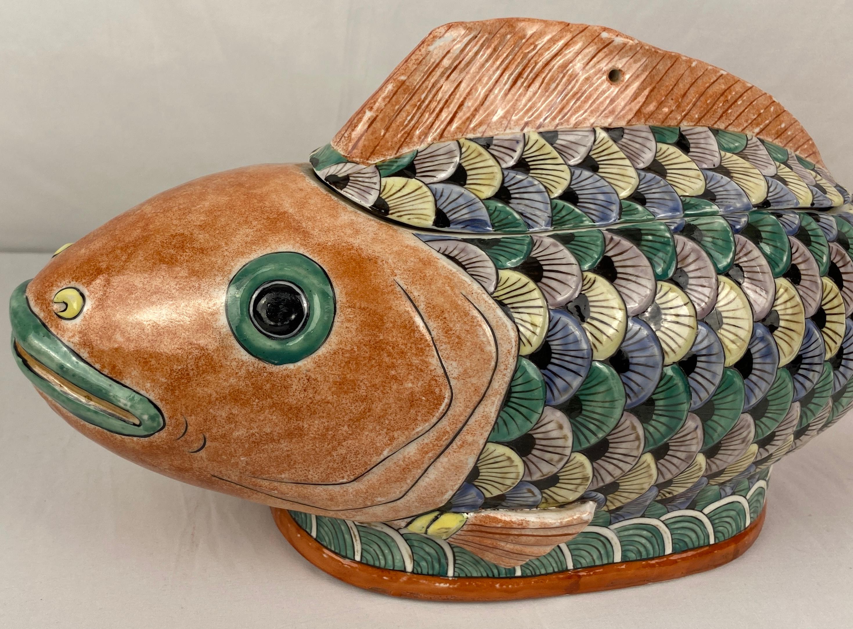 Mid-century ceramic fish, circa 1960s from our recent acquisitions, local travels- a nice catch.

A nice sized hand-crafted ceramic fish sculpture symbolic of prosperity, perseverance and good fortune. This fish displays beautiful colors and is in