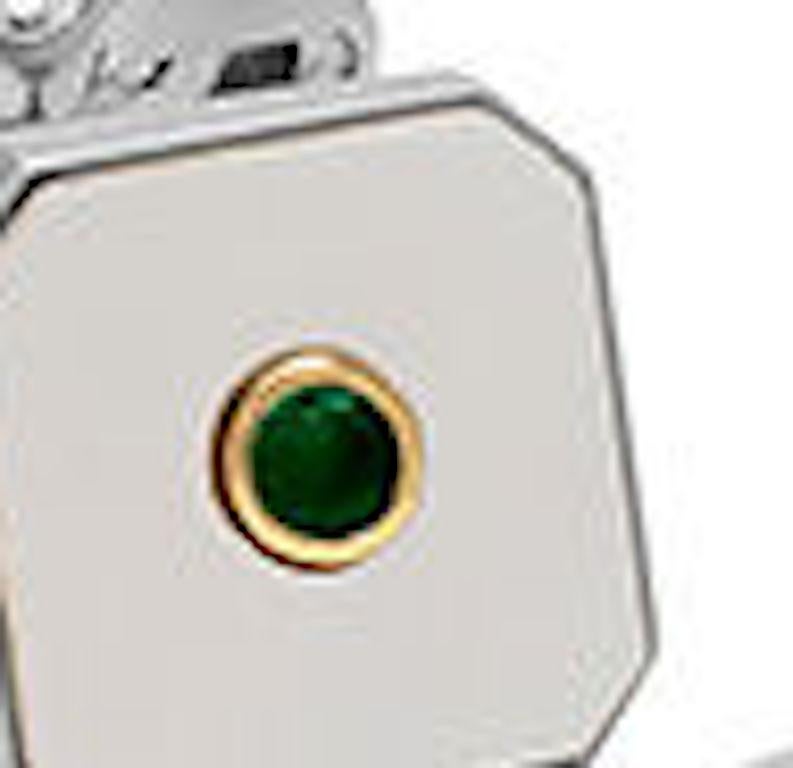 Mother of pearl square cut corner cufflinks with swivel back and emerald set.