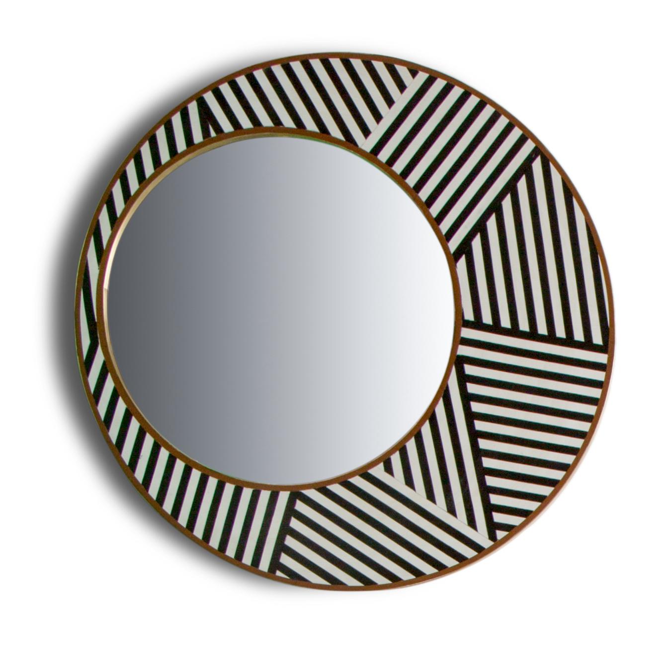 Hand Crafted Round Decorative Mirror with Black & White Design and Brass Borders. 
A voguish and contemporary selection of wall mirrors to lighten up any space in your home. Our ADOM mirrors have a bold rhythmic linear pattern that radiate an objet