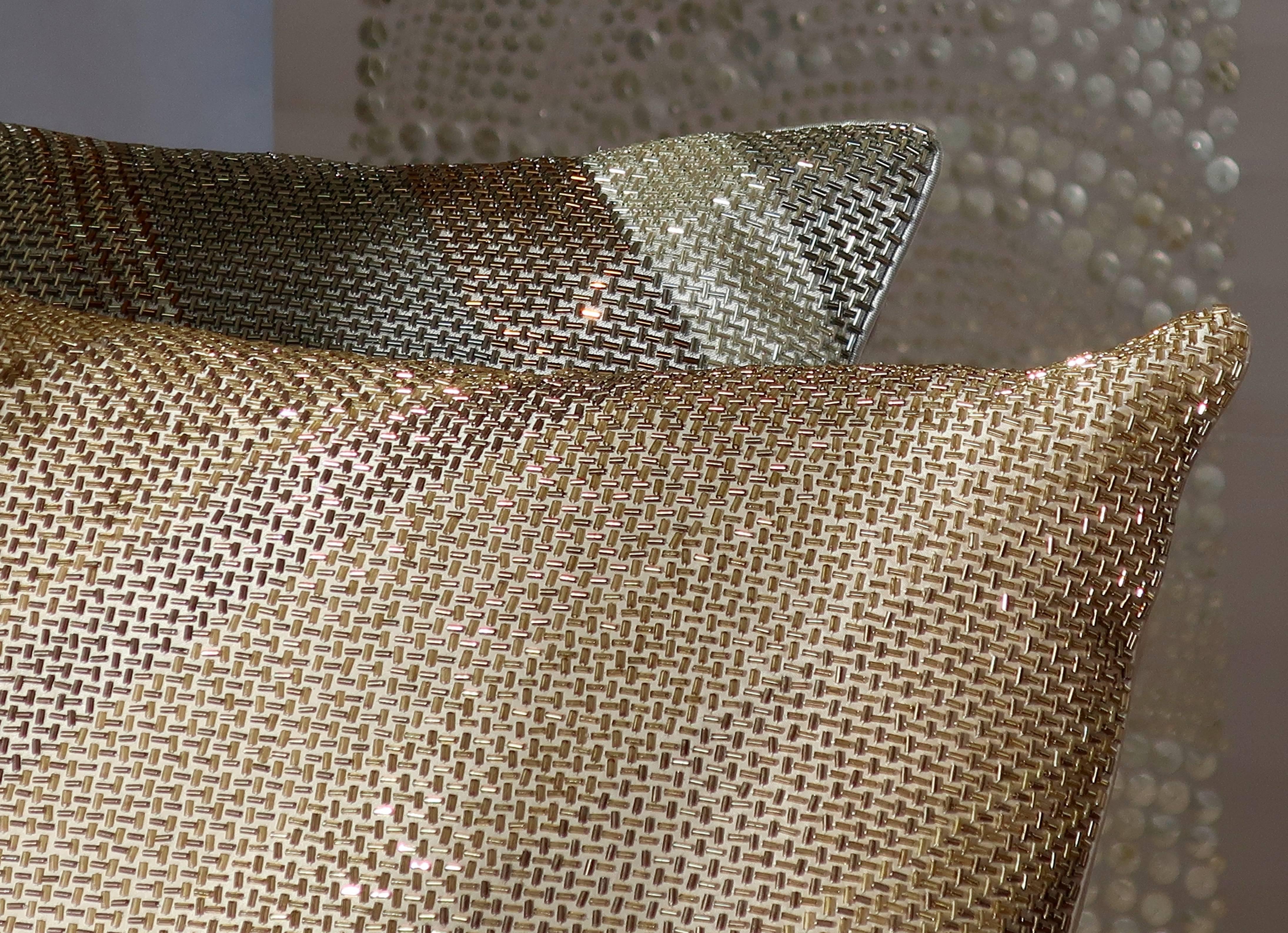 Handcrafted beaded pillow.
Diagonal grid design formed from glass bugle beads.
Shades of gold.
The play with color and position of color gives a subtle individuality to each pillow.
The lustre and reflection of light dancing on the metallic