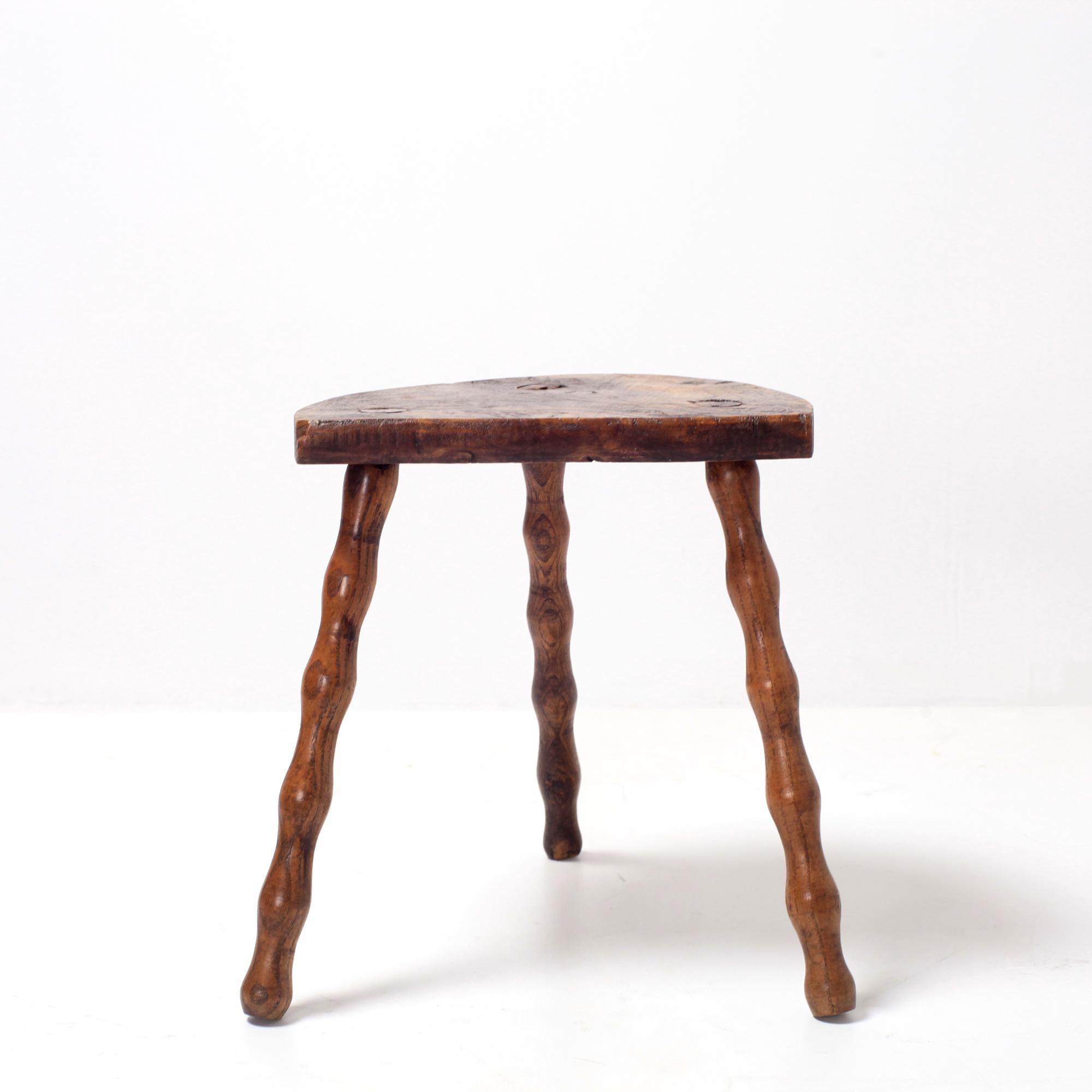 Handcrafted french brutalist solid wood tripod stool or side table
Turned wooden base
No nails or hardware
In the style of Jean Touret, Charlotte Perriand, Francis Jourdain