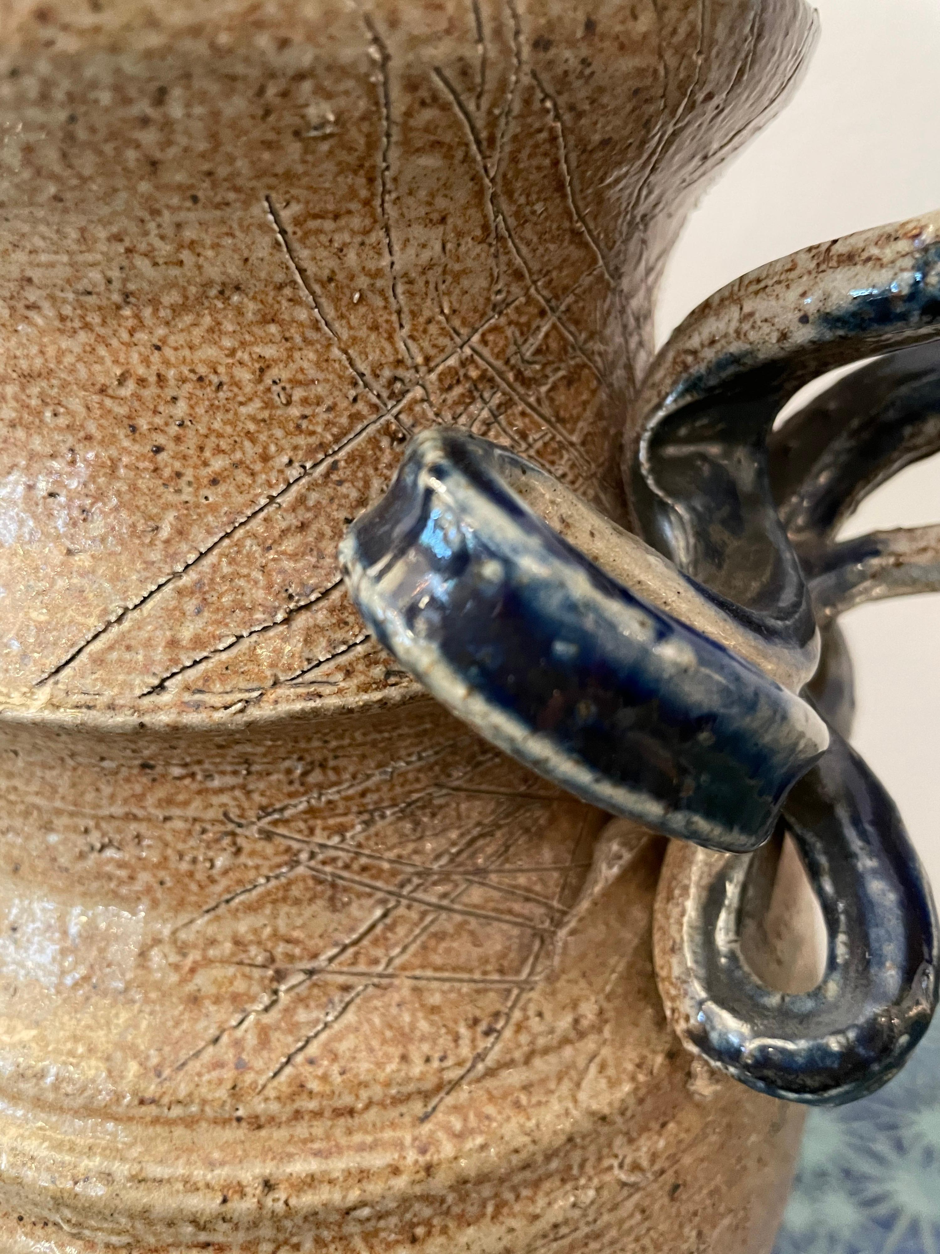 Hand Crafted Glazed Blue Ribbon Handle Vase w/ Natural Textured Base In Good Condition For Sale In East Hampton, NY