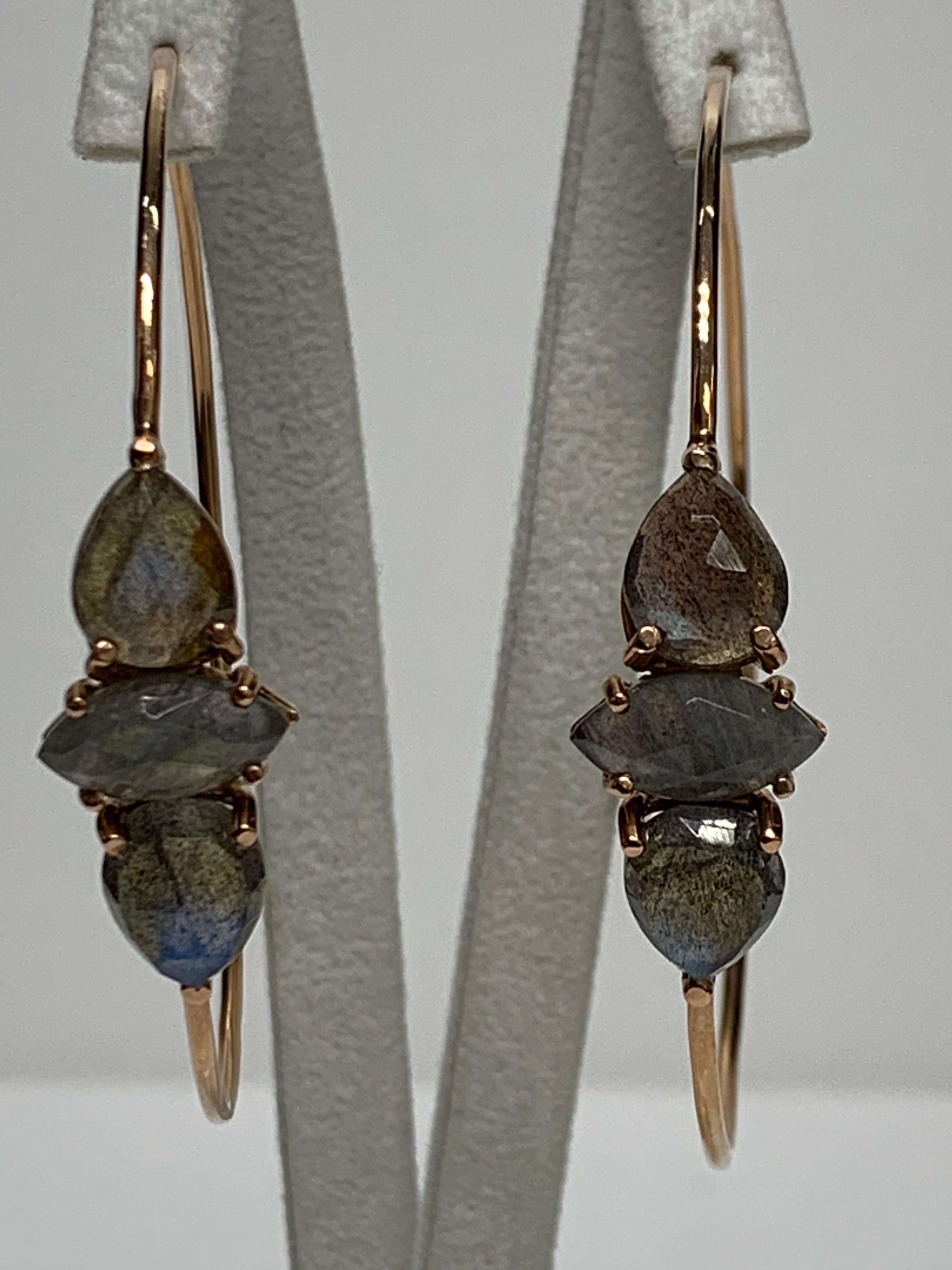Labradorite Marquise, Rose Gold Hoops Earrings

Featuring a pair of Labradorite Marquise Stone Hoop Earrings, set in 14K Rose Gold.

This one-of-a-kind pair of earrings was created by hand is certified, appraisal included, 100% insured. Processed
