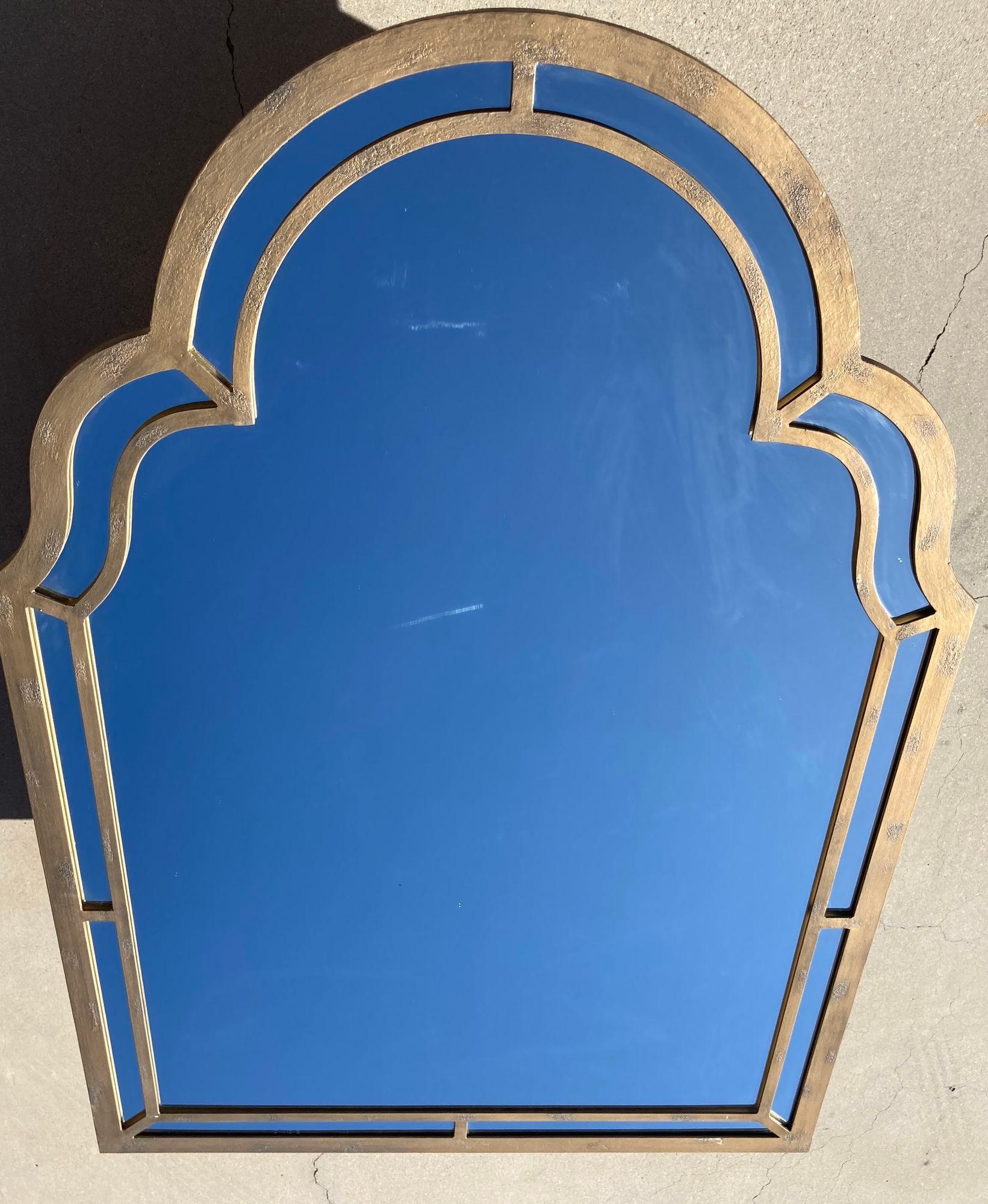 Very large substantial hand-crafted large solid wrought iron mirror.
Moorish arched mirror that will work with any Orientalist decor or traditional mediterranean or spanish colonial Santa Barbara California estate decor.
Large and heavy handcrafted