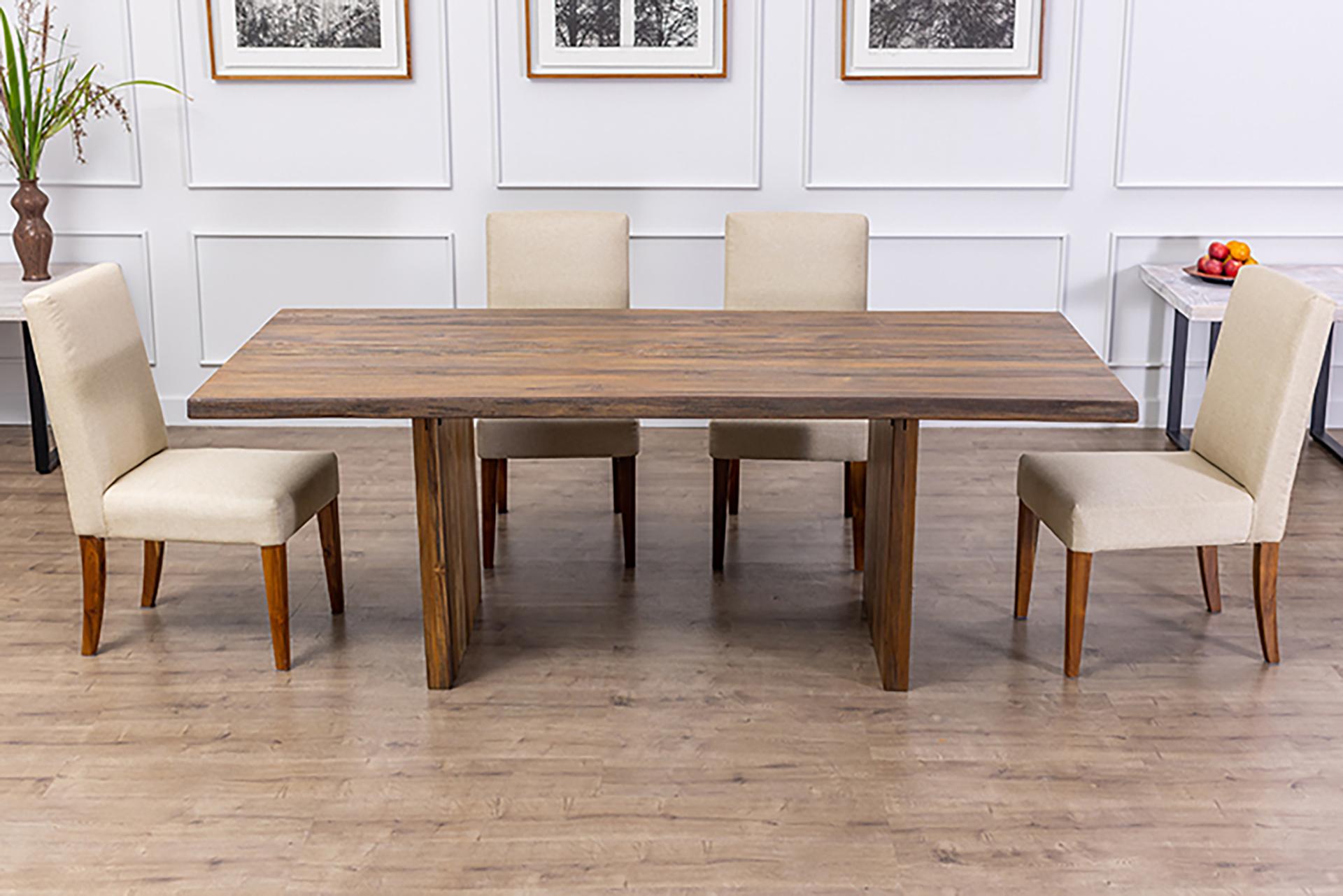 The Table Company makes only 100% solid, hardwood furniture. We primarily use Thai/Burmese Teak, North American Red and White Oak, and old-growth Cham-Cha (Siam Acacia). 
Wood preparation is very important, all of our wood is kiln-dried to