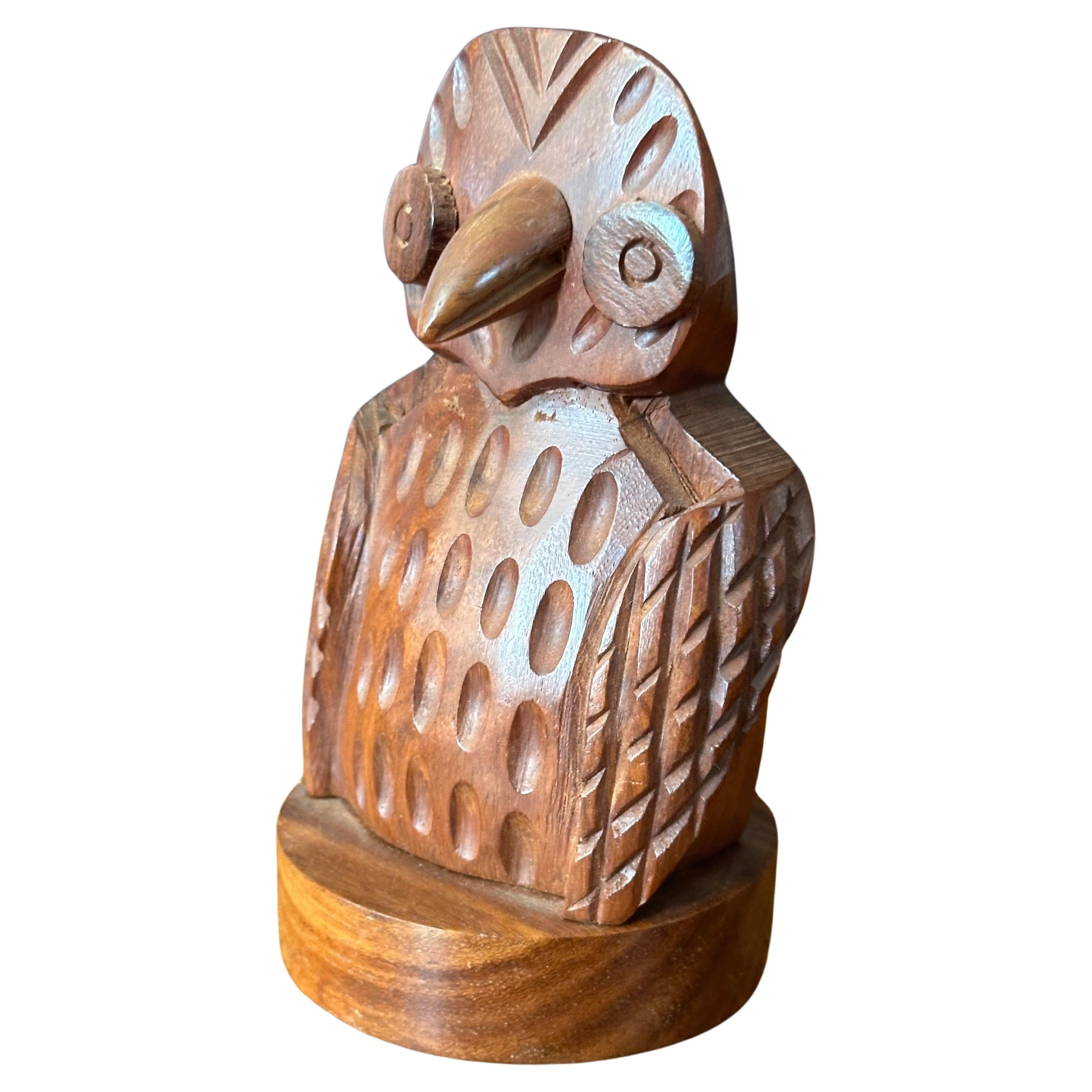 A hand-crafted mahogany wood owl letter holder / sculpture, circa 1970s. The piece is in very good vintage condition with no chips or cracks and measures 3