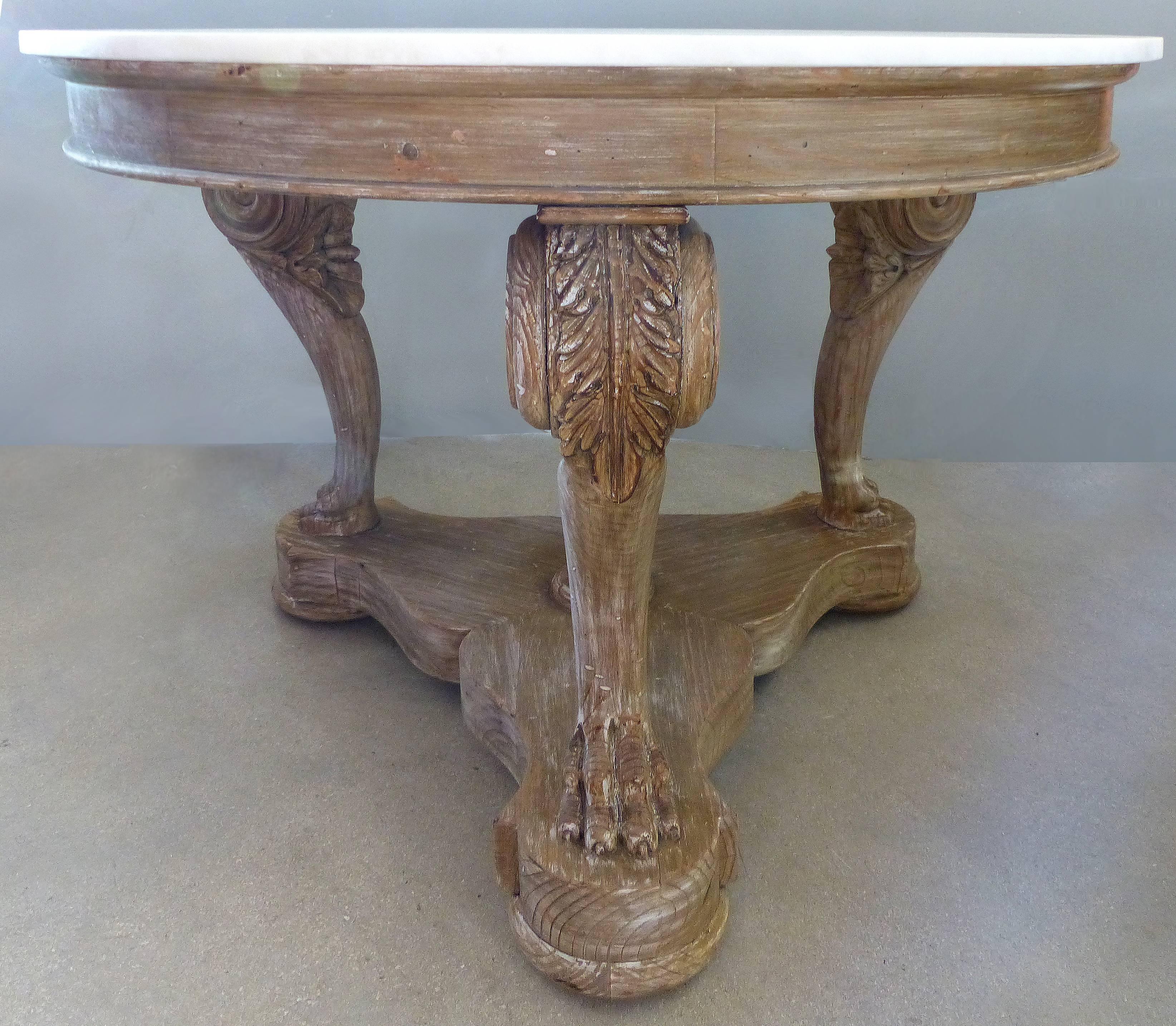 William Switzer 'Vancouver, B.C. Hand-Crafted Marbletop Center Table

Offered for sale is a carved center table with a white-washed finish and marble top handcrafted by William Switzer of Vancouver, British Columbia. The top is supported by three