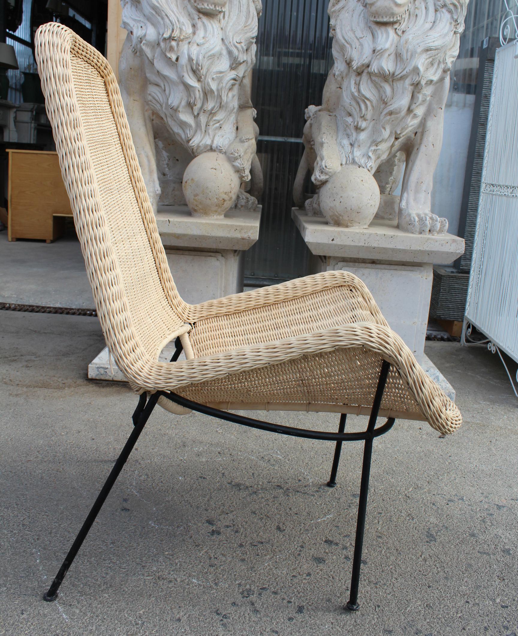 Contemporary Hand Crafted Natural Rattan Chair with Iron Legs and Back