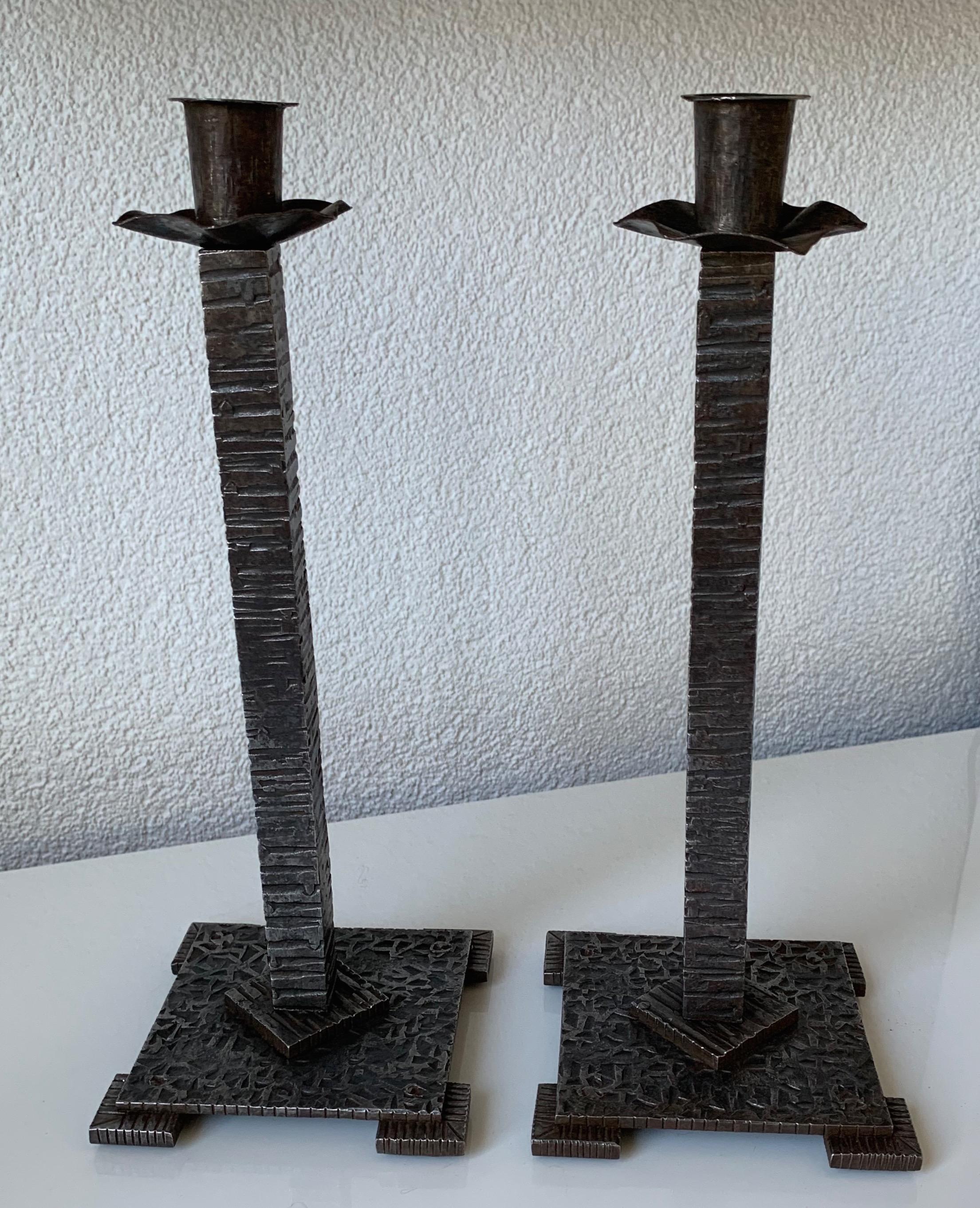 Beautiful and very stylish pair of timeless candle sticks.

If you are looking for beautiful antiques to grace your living space then this hand forged and timeless pair could be yours to own and enjoy soon. They are truly stylish, beautifully