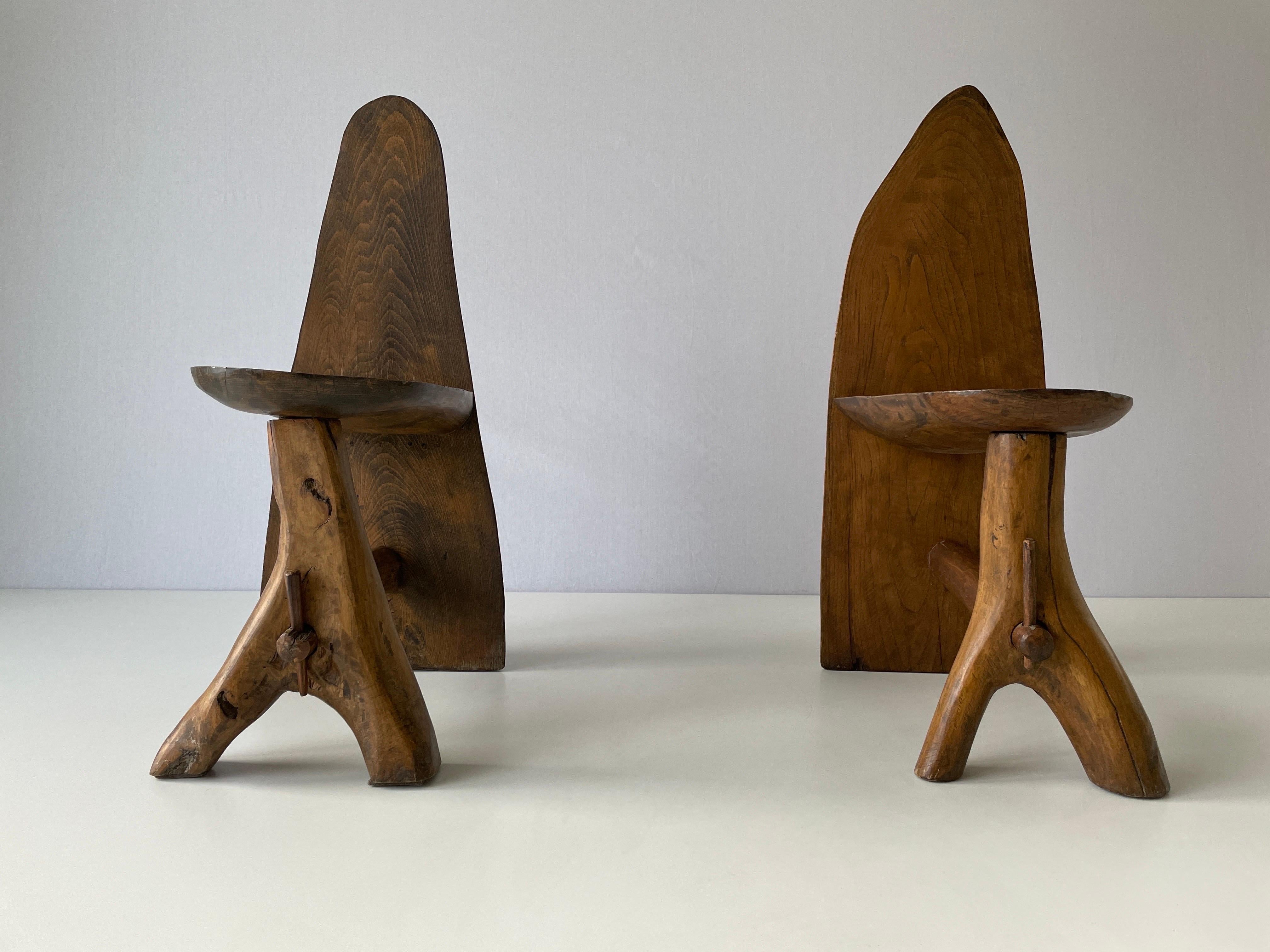 Hand-crafted Primitive Design Solid Wood Pair of Chairs, 1950s, Italy

Wear consistent with age and use.

Measurements: 
Height: 75 cm
Width: 27 cm
Depth: 47 cm
Seat height: 37 cm