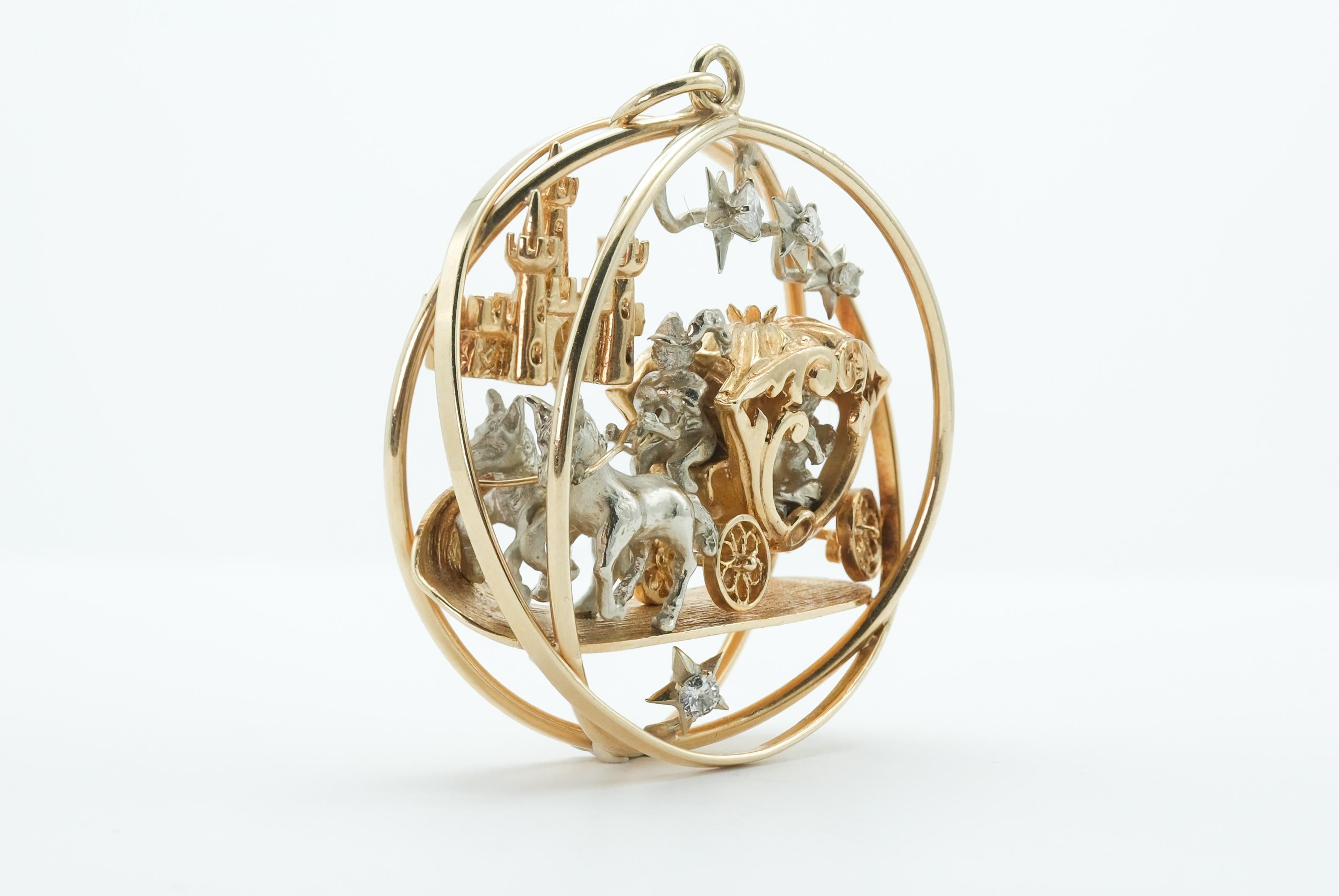 This meticulously crafted pendant is a unique masterpiece that brings to life an enchanting scene in 14 karat yellow and white gold. The image portrays a princess seated in a horse-drawn carriage, guided by a coachman and his two horses journeying