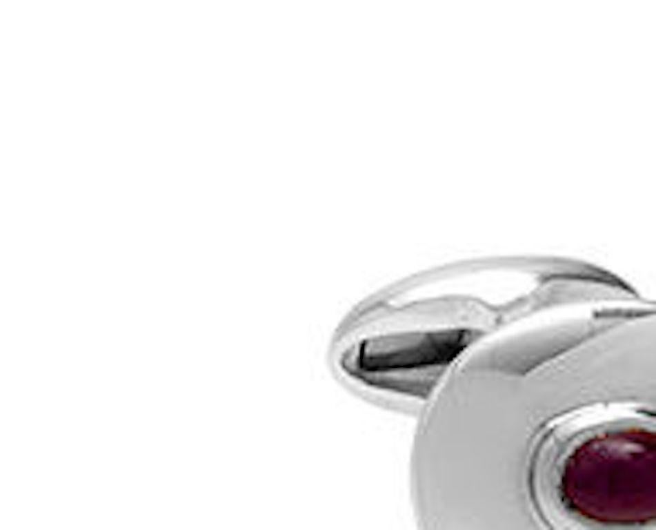 Sterling silver oval 9-carat gold mount cufflinks with ruby set.