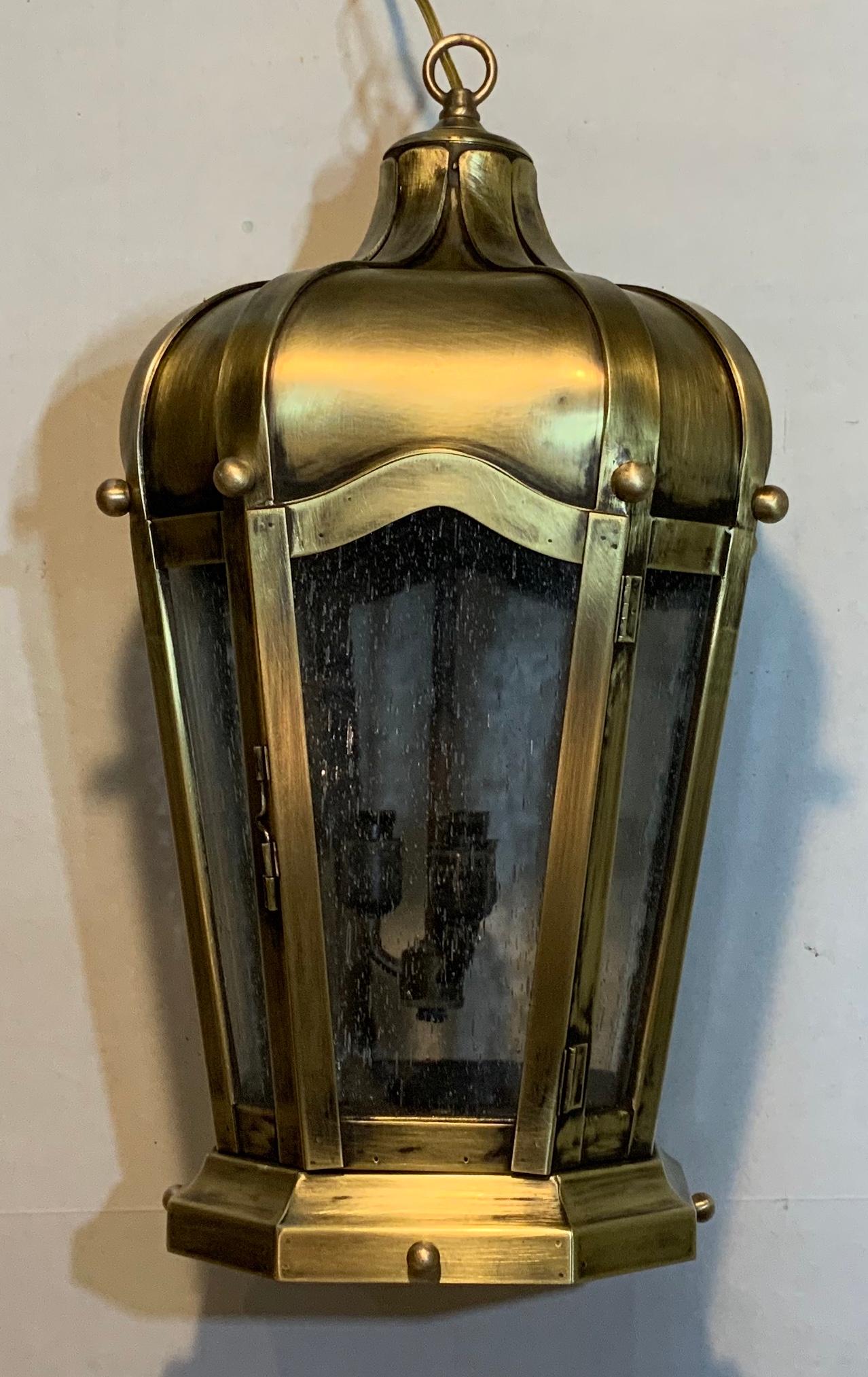 Beautiful hanging ceiling lantern in crown style top, made of solid brass. Quality handcrafted, with seeded glass. Eelectrified with three 40/watt lights, suitable for wet locations, ready to use.
Will look great indoor or outdoor.