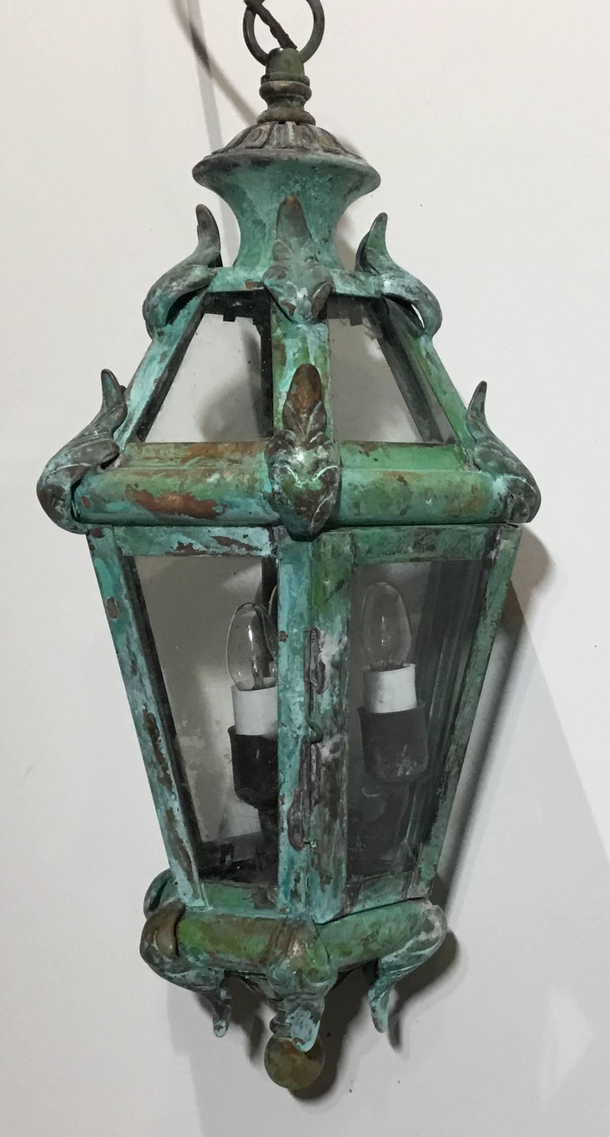 Elegant small lantern made of solid brass nicely weathered patina, with 3 40/watt light stem.
Include canopy and 2 ft chain.
Great decorative lantern.