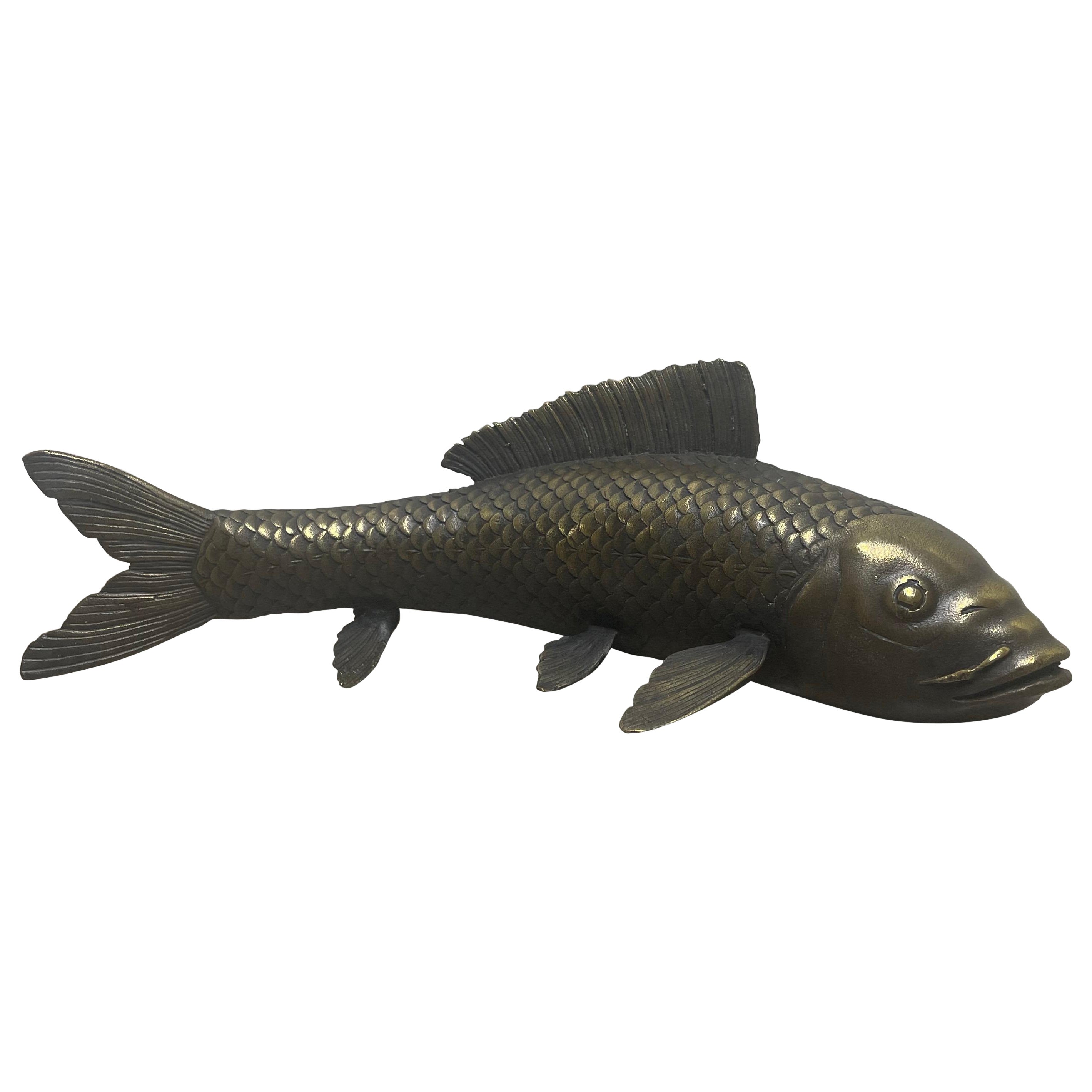 Hand crafted solid bronze Japanese Koi fish. Signed