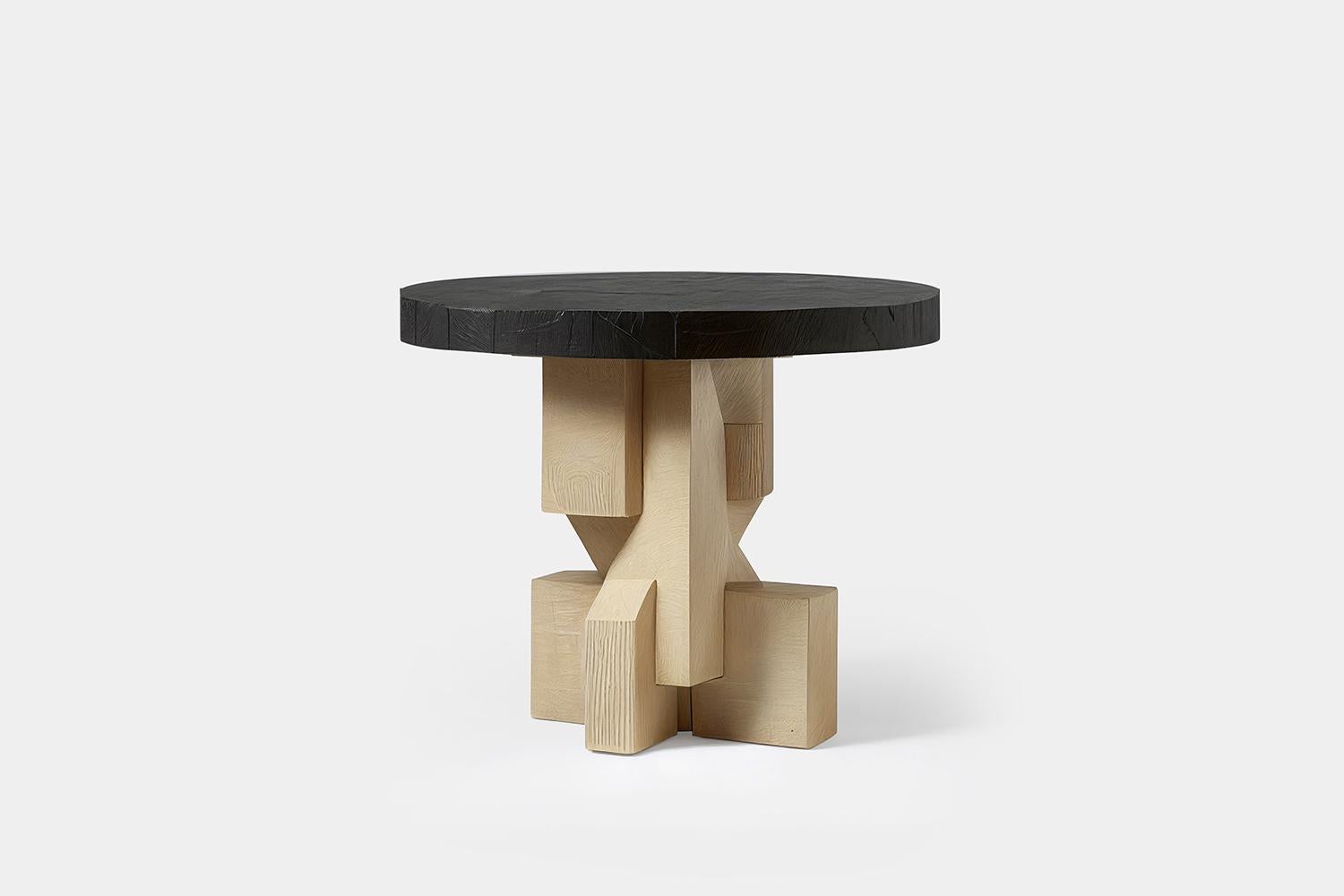Hand-crafted solid thick maple side table with faceted base and black round table top. 
Product made to order; some variances may apply to the final piece. 

——

NONO is a Mexican design brand with more than 10 years of experience dedicated to