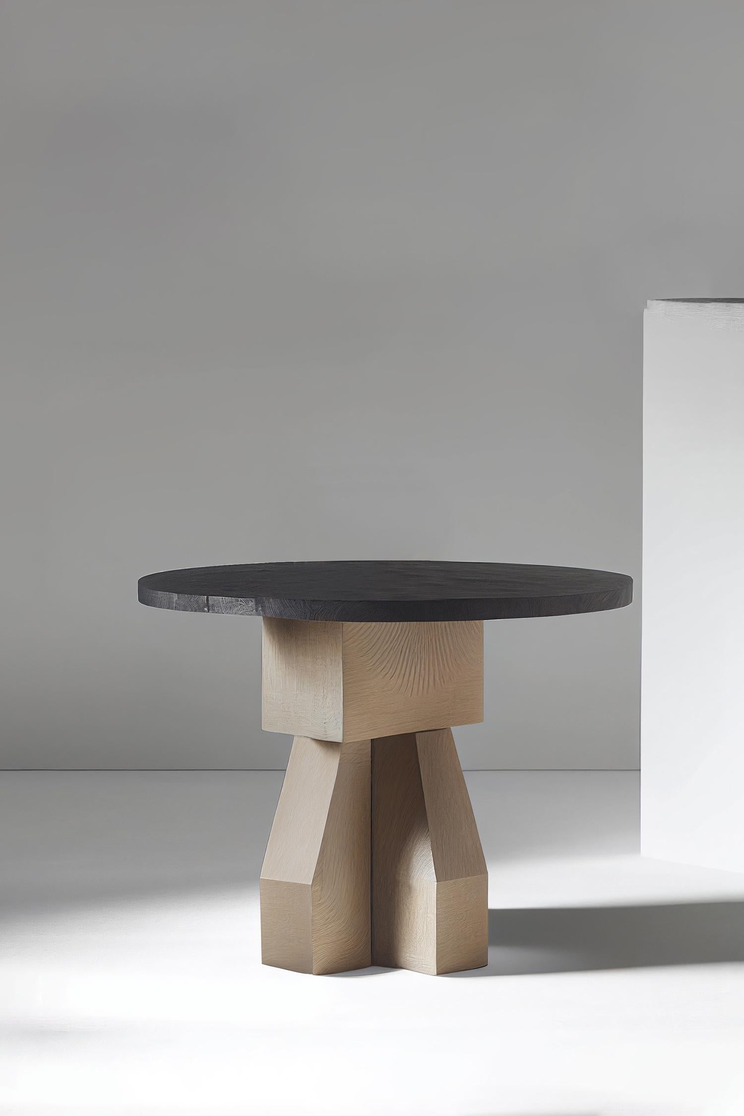 Hand-crafted solid thick wood side table with faceted base in gray tint and black round table top. 
Product made to order; some variances may apply to the final piece. 

——

NONO is a Mexican design brand with more than 10 years of experience