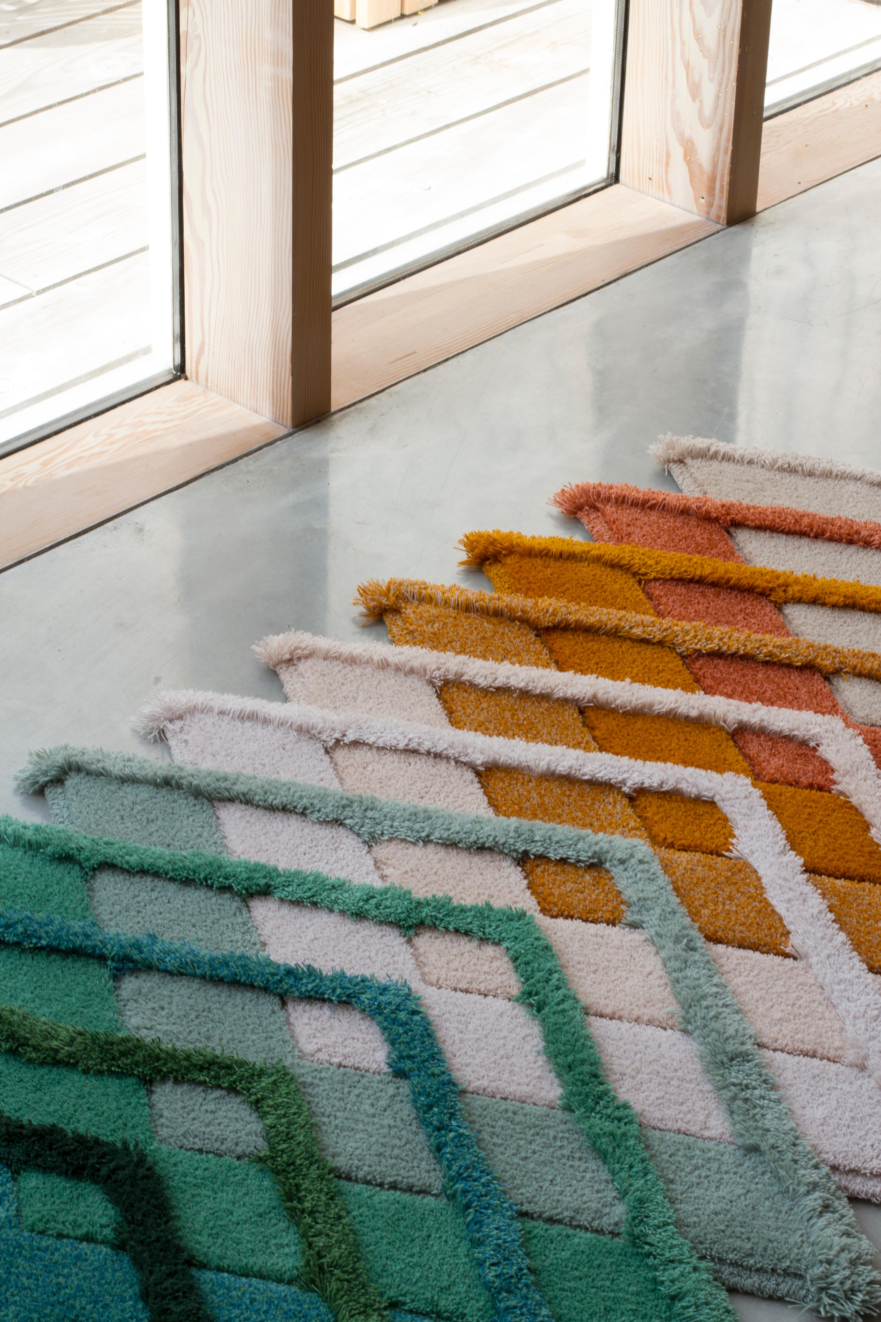 Our new collection of Granite + Smoke hand tufted rugs are made in collaboration with British Rug makers Roger Oates Design. Made in the UK using a 100% British blended wool, a specially developed yarn spun and dyed in Yorkshire. Each rug has been