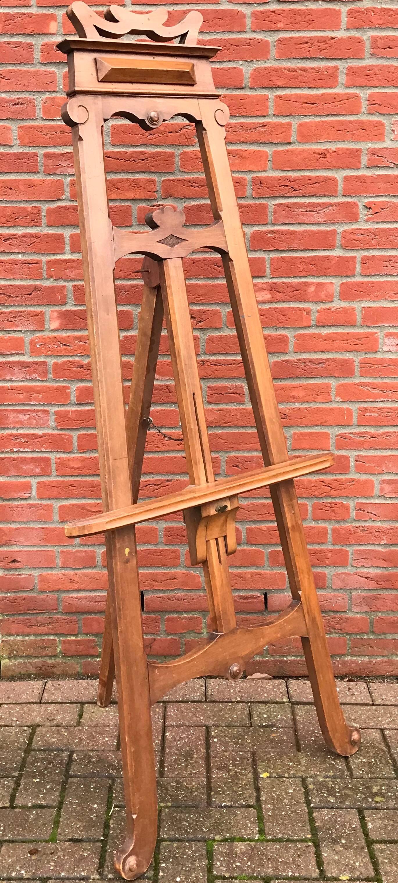 Early 1900s original presentation picture stand.

This beautifully made and wooden picture stand is a joy to look at, even if there is no picture displayed on it. Thanks to the solid structure and the three legged base it is really stable. The
