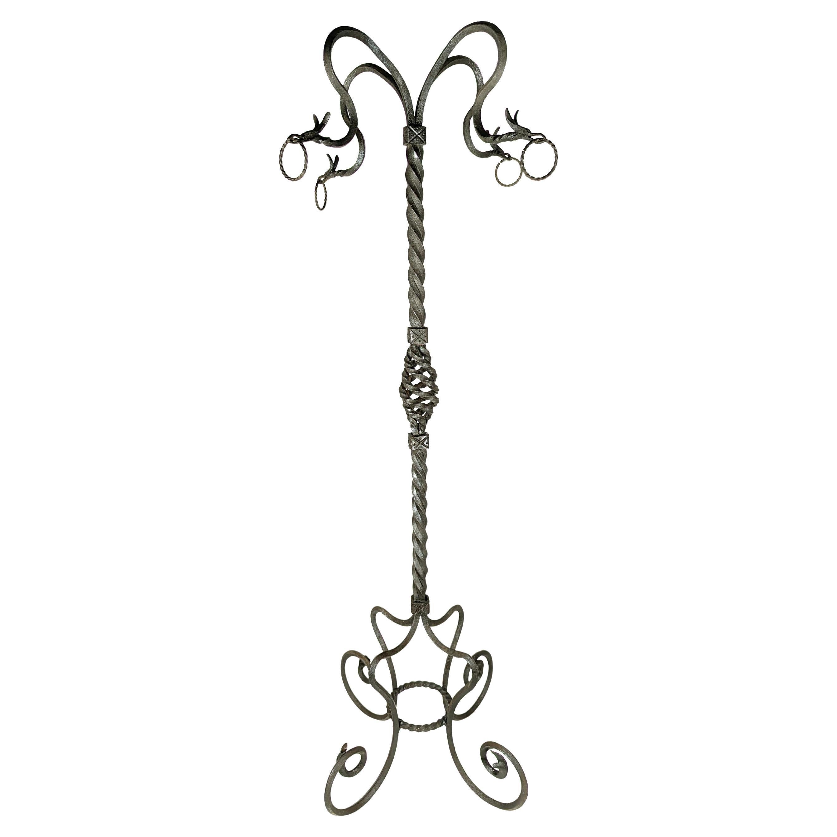 Hand-crafted wrought iron pedestal from the early 1900s attr to A. Mazzucotelli For Sale